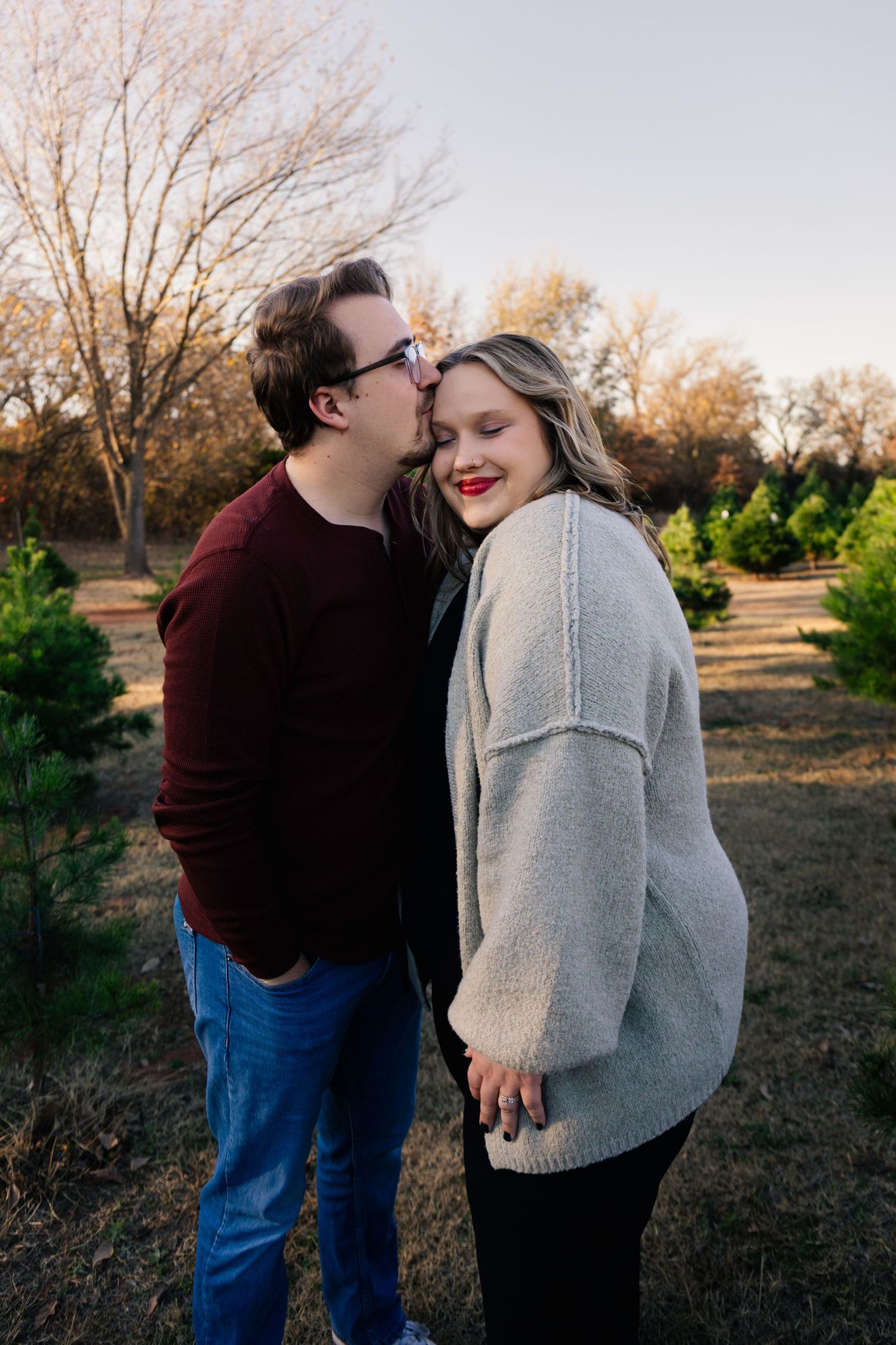 Norman, OK couples photoshoot at Christmas tree farm by Edmond & OKC photographer Taylor Maze, natural light, true-to-color portraits.