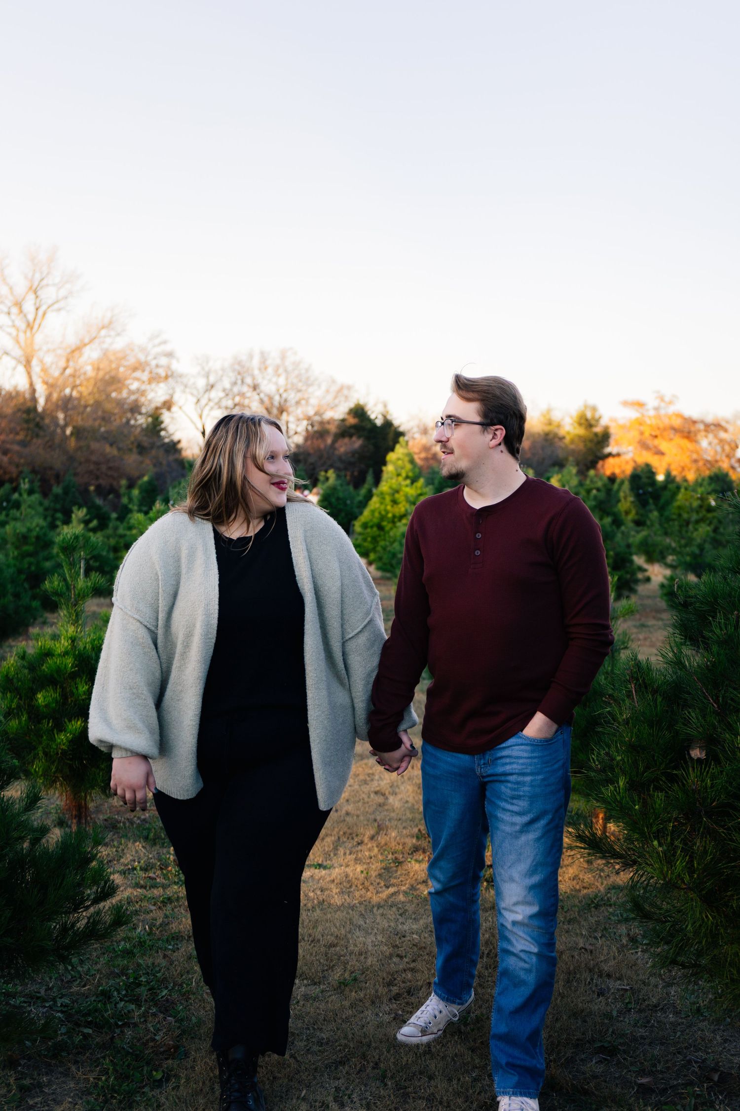Norman, OK couples photoshoot at Christmas tree farm by Edmond & OKC photographer Taylor Maze, natural light, true-to-color portraits.