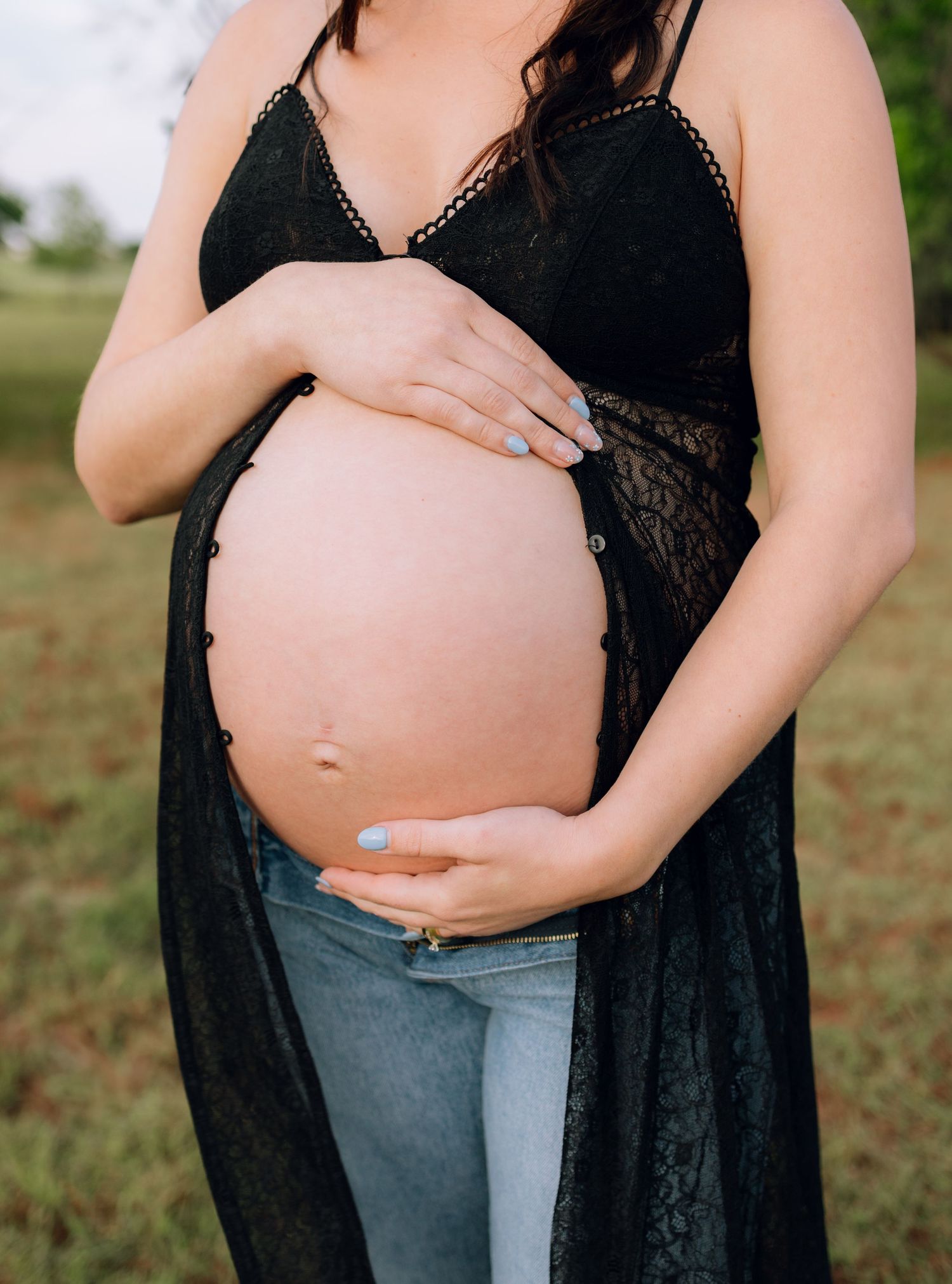 Edmond, OK maternity session in field at golden hour with flower shirt by Taylor Maze, Edmond & OKC photographer, natural light portraits.