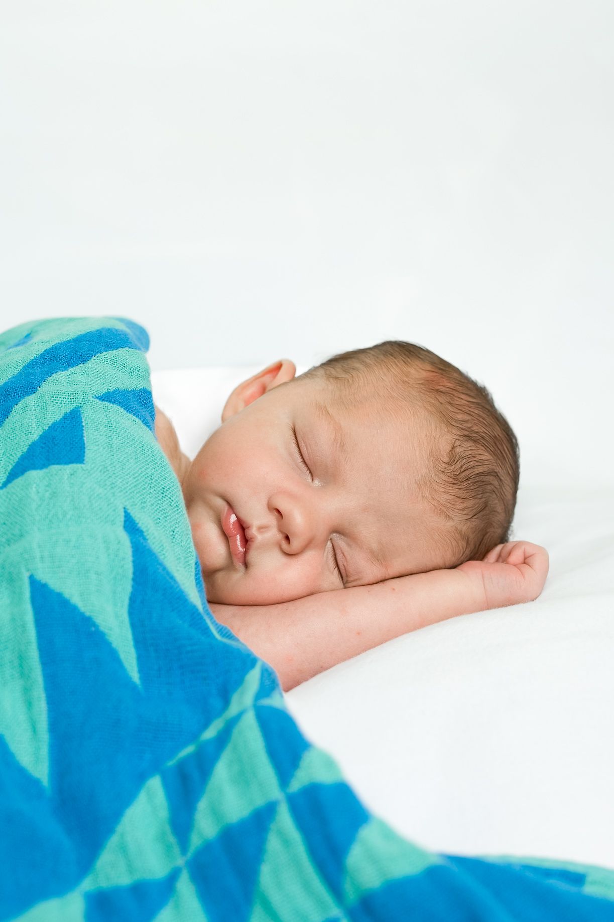 Indoor newborn session in Edmond, OK by Taylor Maze, Edmond & OKC photographer, natural light, true-to-color lifestyle newborn portraits.