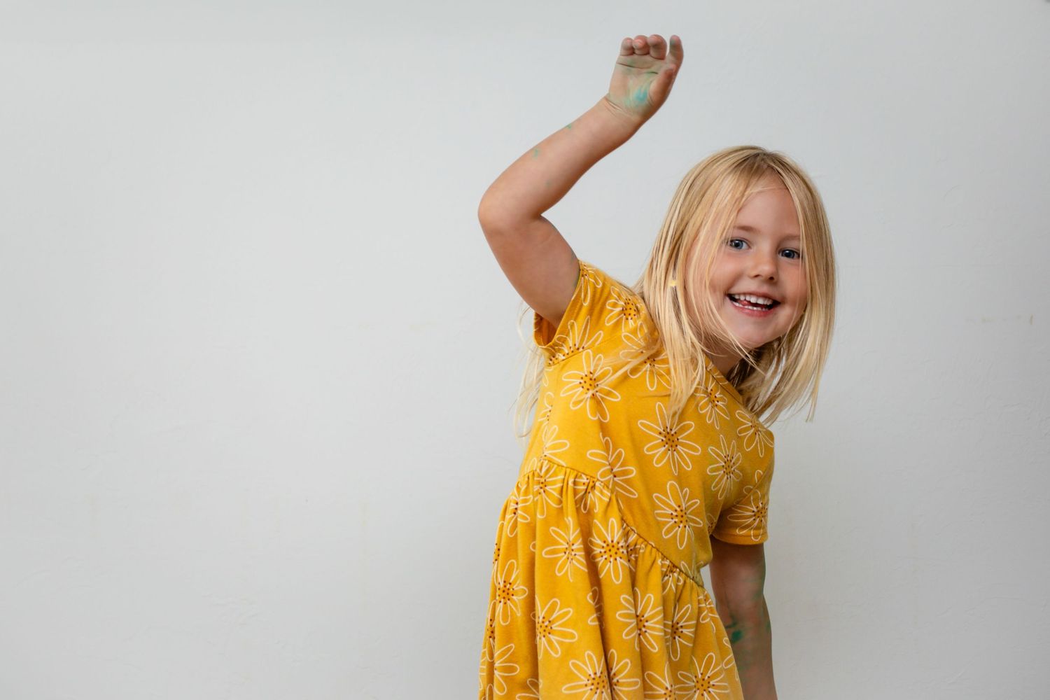 Indoor little girl session in yellow outfit in Guthrie, OK by Taylor Maze, Edmond & OKC photographer, natural light, true-to-color portraits