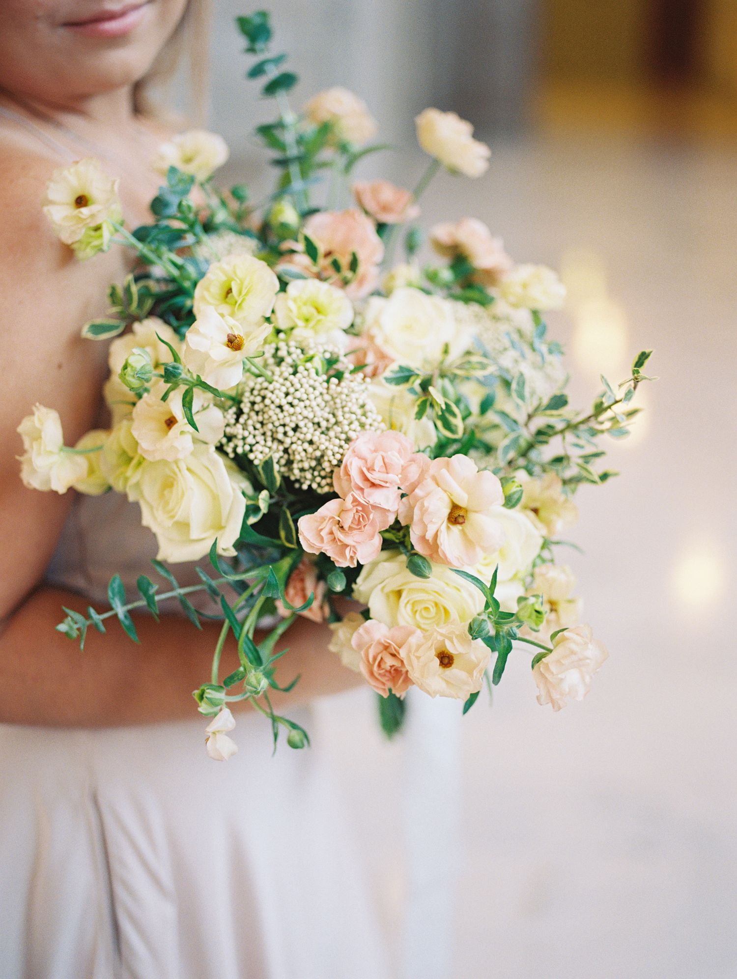 Loose garden-style bouquet with film texture and soft shadows.