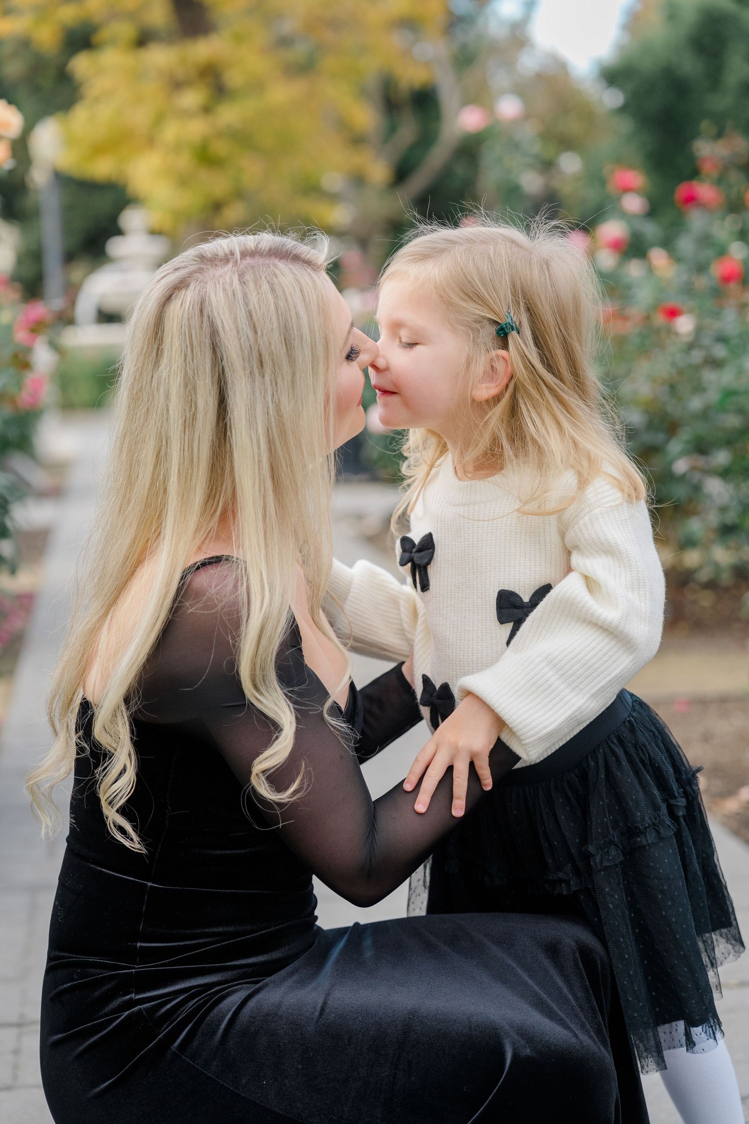 Outdoor lifestyle family photo in Boise with warm lighting and neutral outfits.