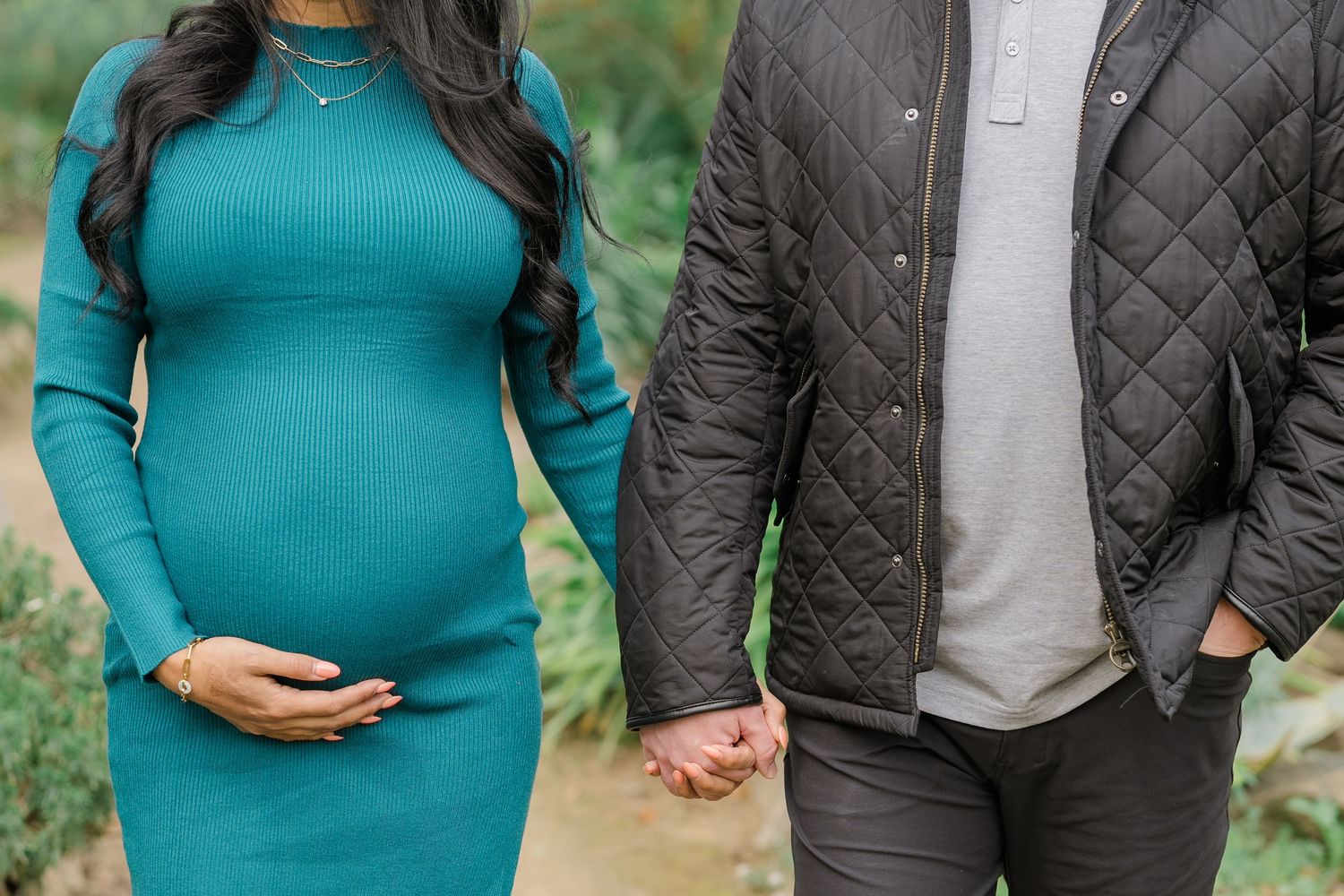 Outdoor lifestyle family photo in Boise with warm lighting and neutral outfits.