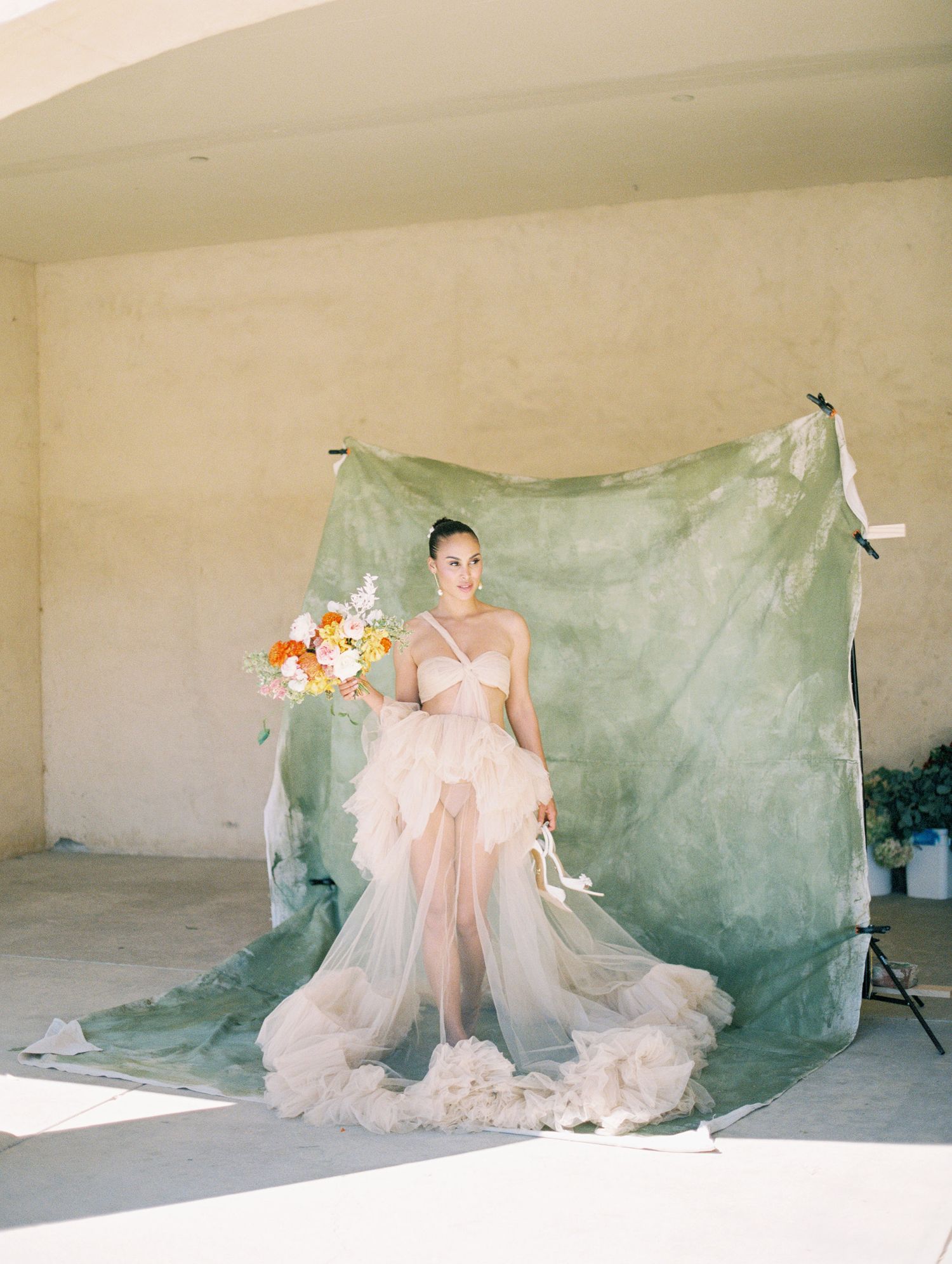 Editorial bridal close-up on 35mm film, soft focus and glowing natural light.