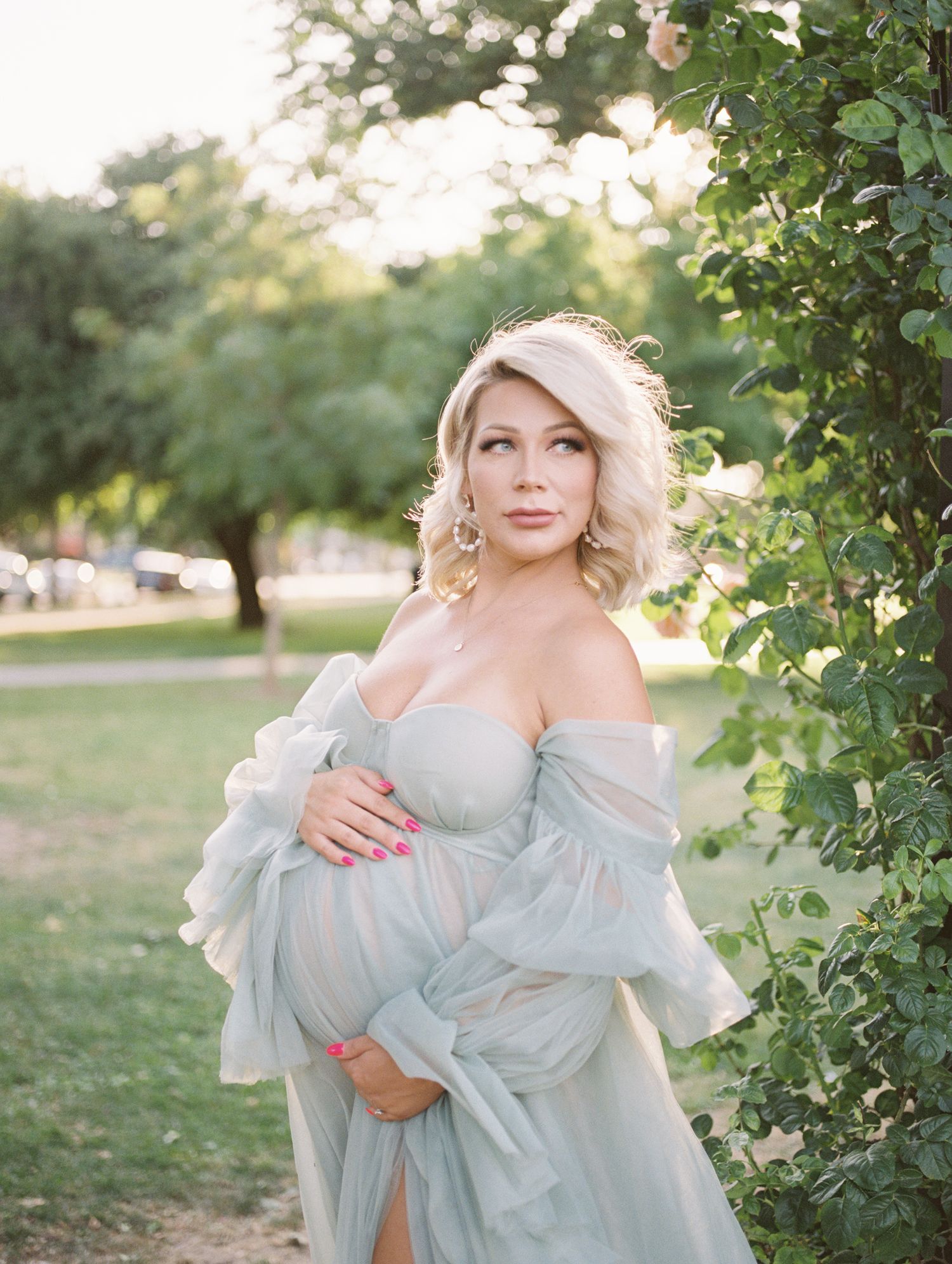 Outdoor lifestyle family photo in Boise with warm lighting and neutral outfits.