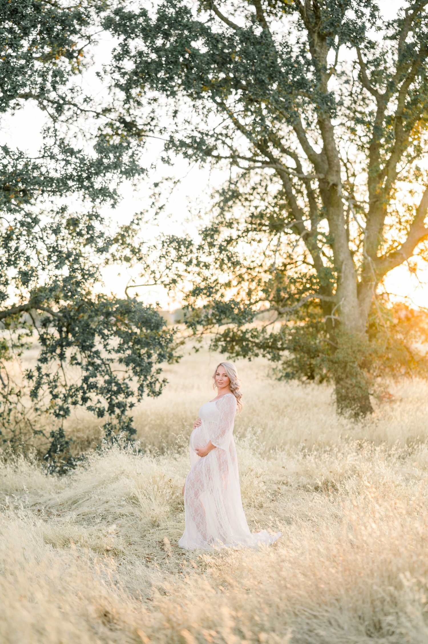 Intimate motherhood photo session outdoors at sunset in Meridian, ID.
