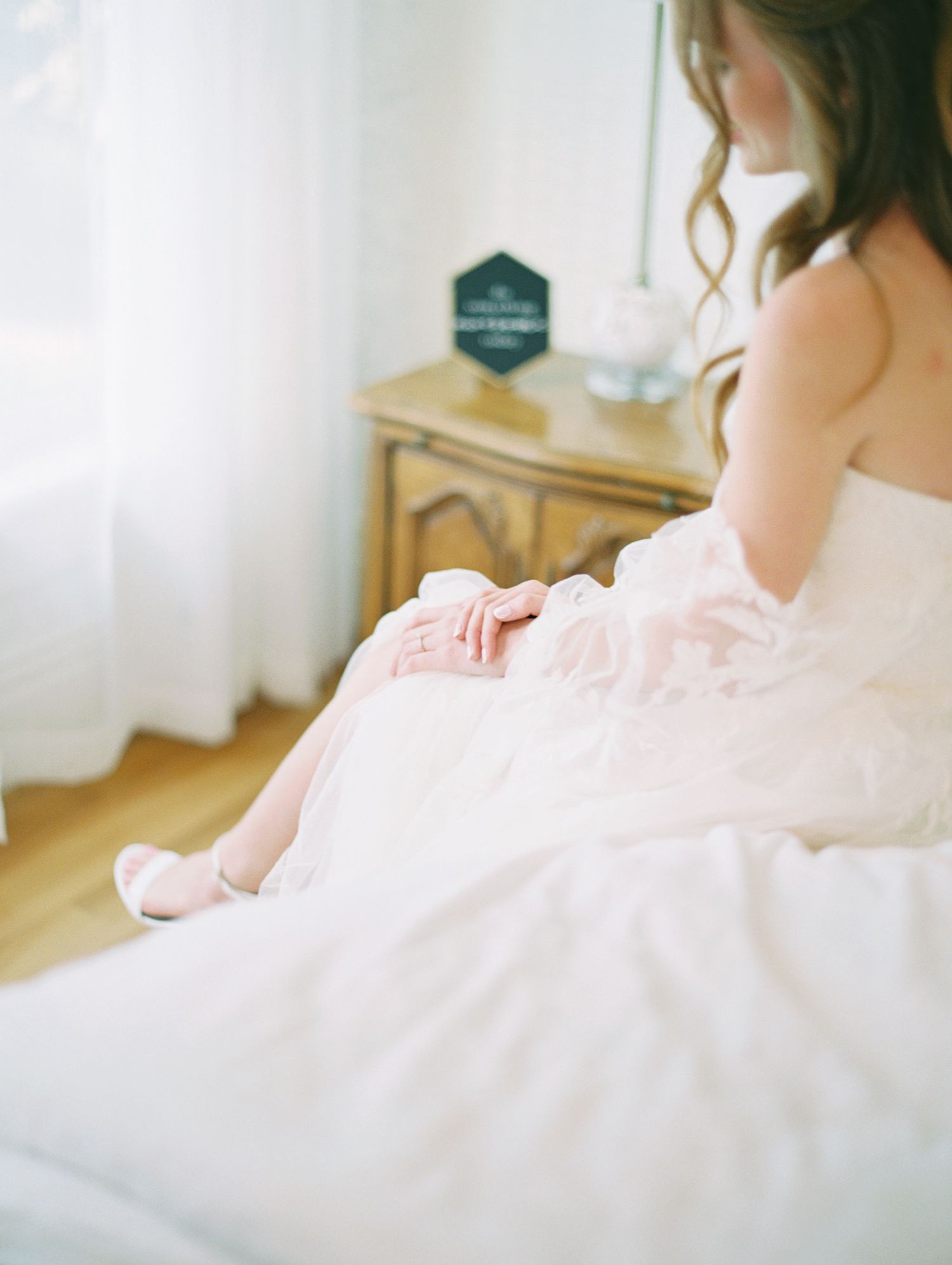 Editorial bridal close-up on 35mm film, soft focus and glowing natural light.