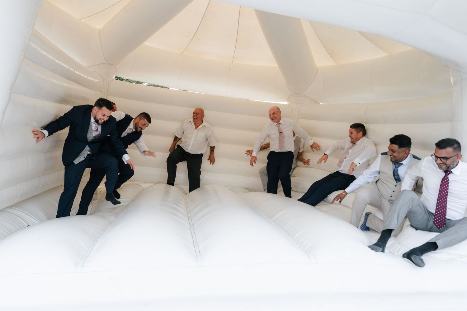 People demonstrating tai chi moves in sequence against a white background.