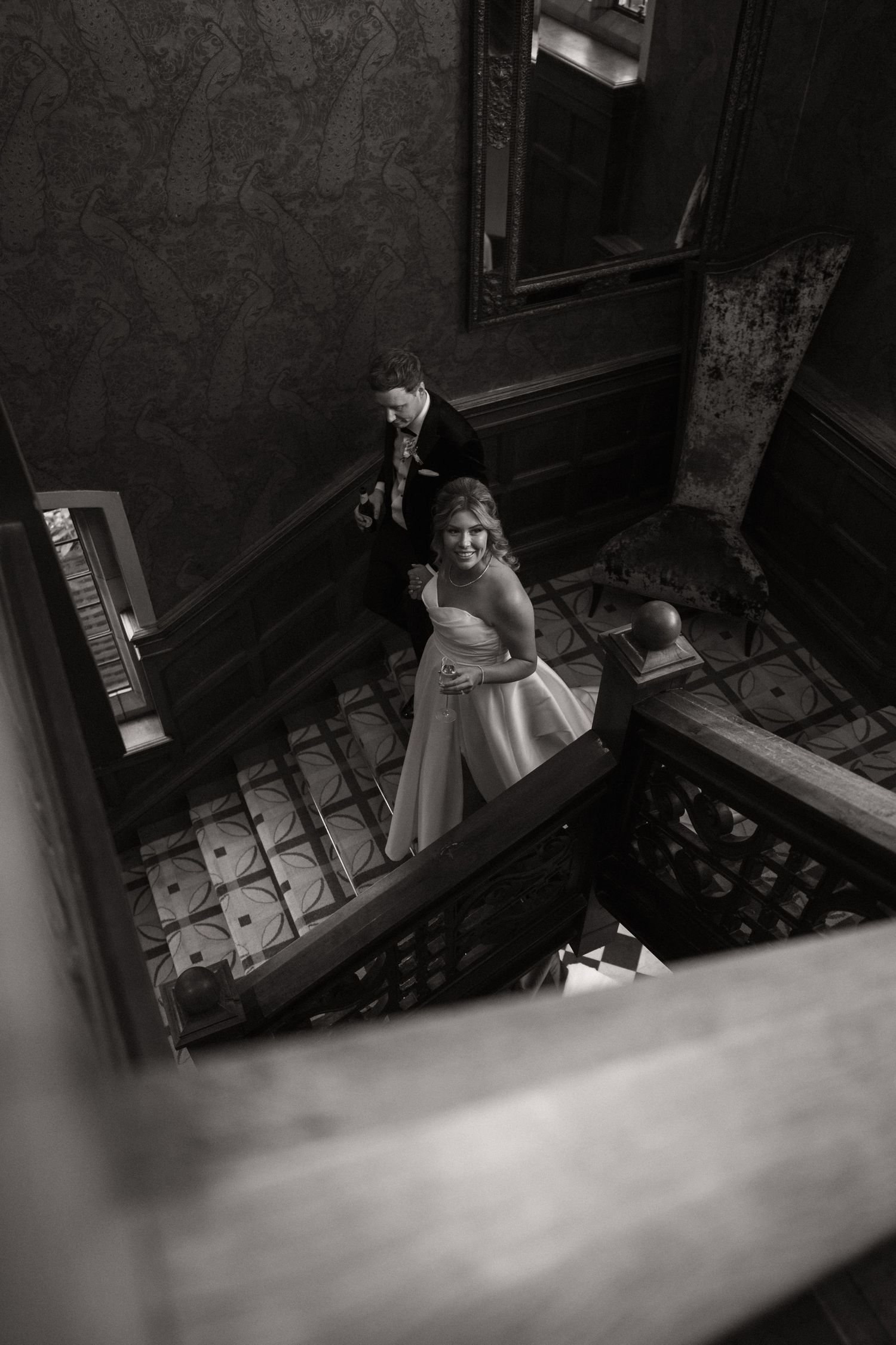 A sequence of black and white photos shows a person looking through a window or opening in dramatic lighting.