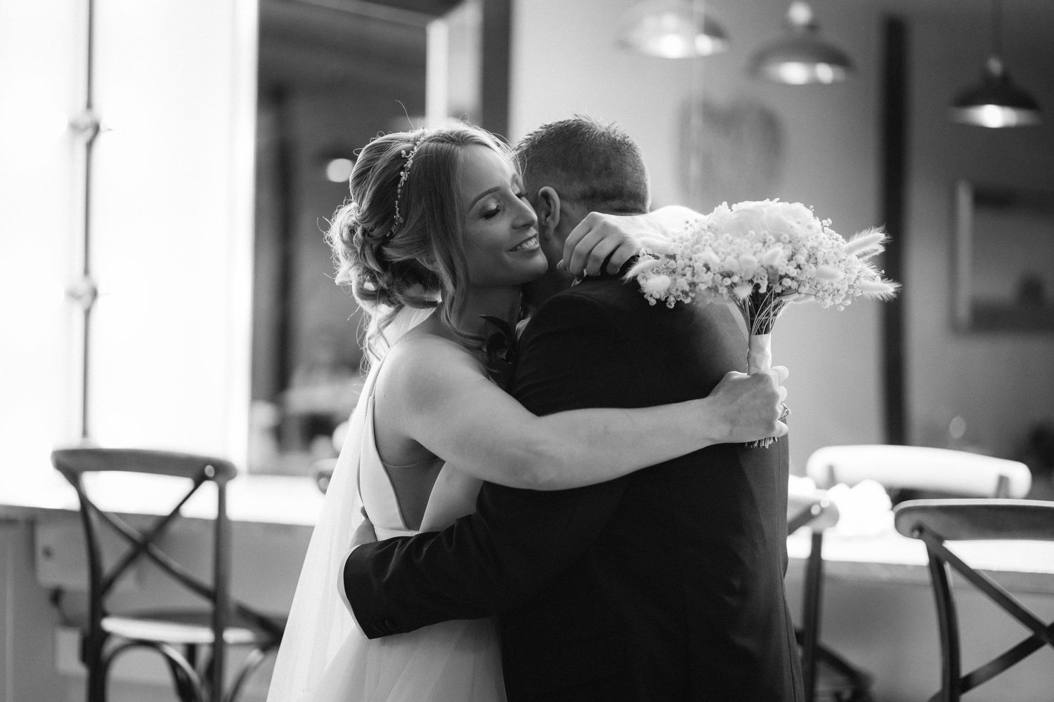 Black and white photos show tender moments between dancing couples in formal attire at an event.