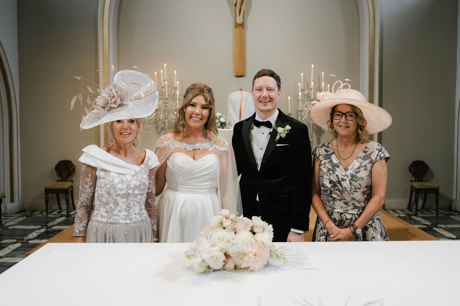 A collection of wedding photos showing formal indoor ceremony and reception moments with elegant decor and floral arrangements.