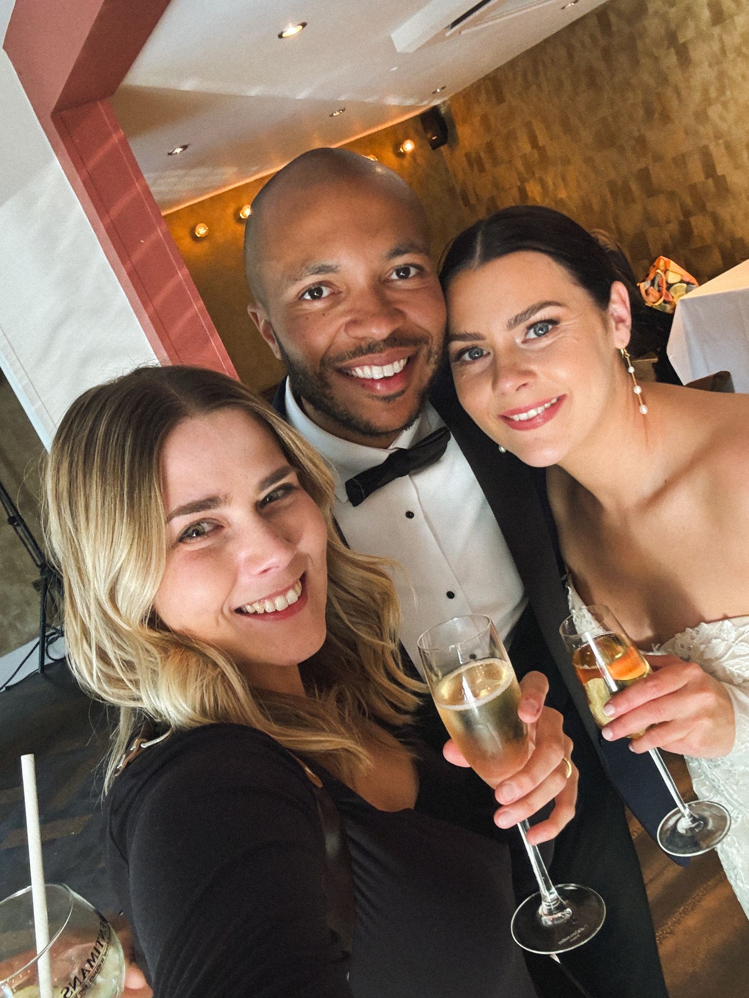 Four similar selfies showing a couple enjoying drinks together at what appears to be a restaurant or bar setting.