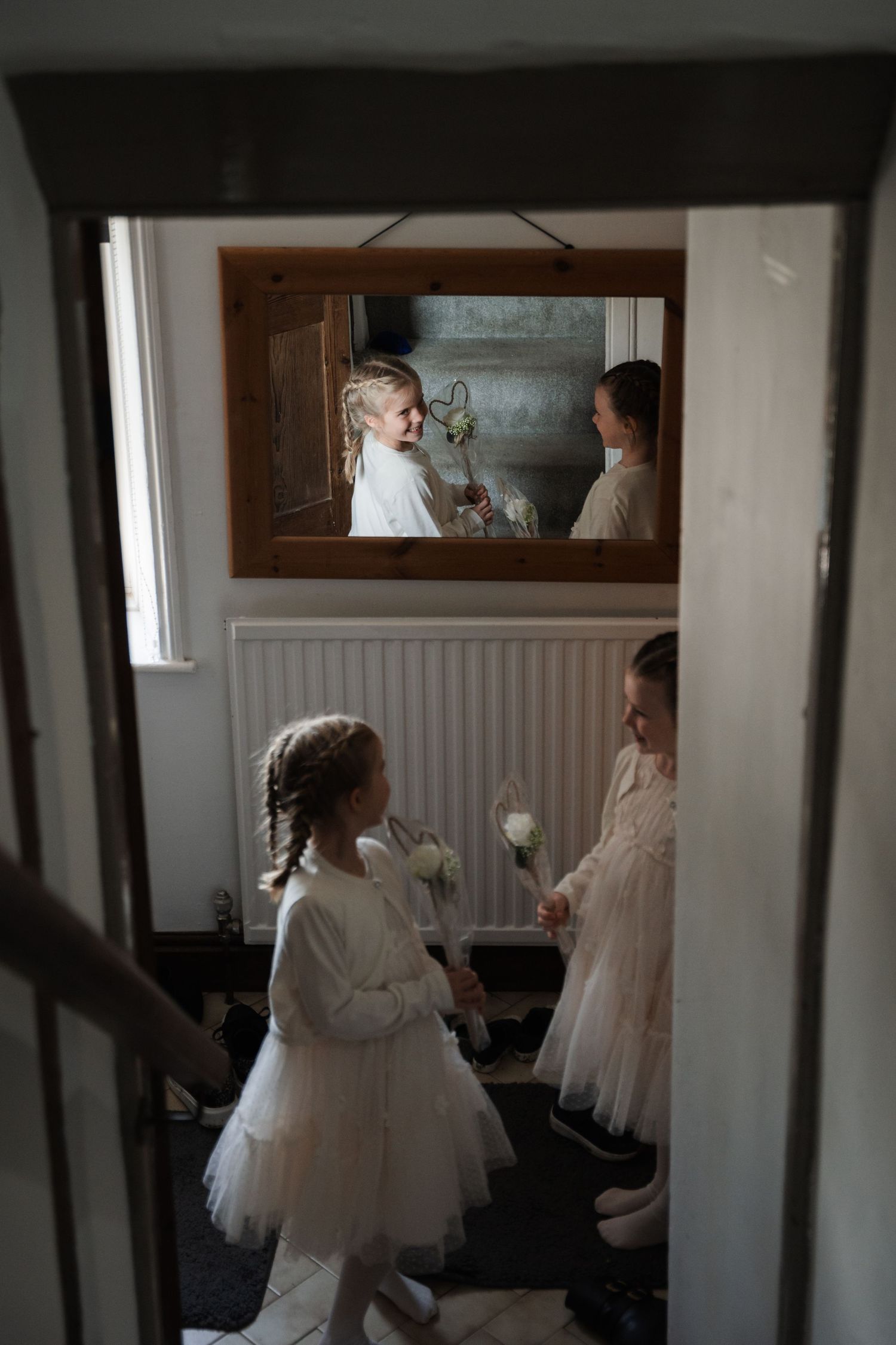 Soft interior shots of wedding preparations in a sunlit room.