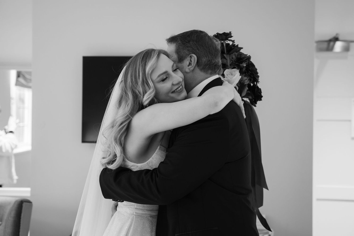 Black and white photo series showing intimate dance moments between couples at a wedding celebration.