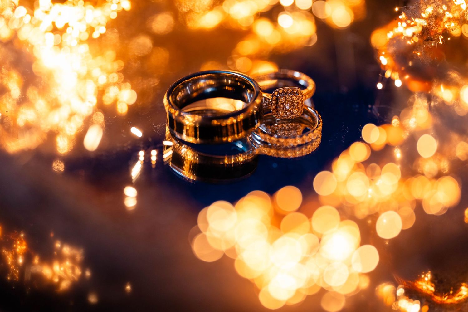 Warm golden bokeh lights create a romantic and dreamy background effect.