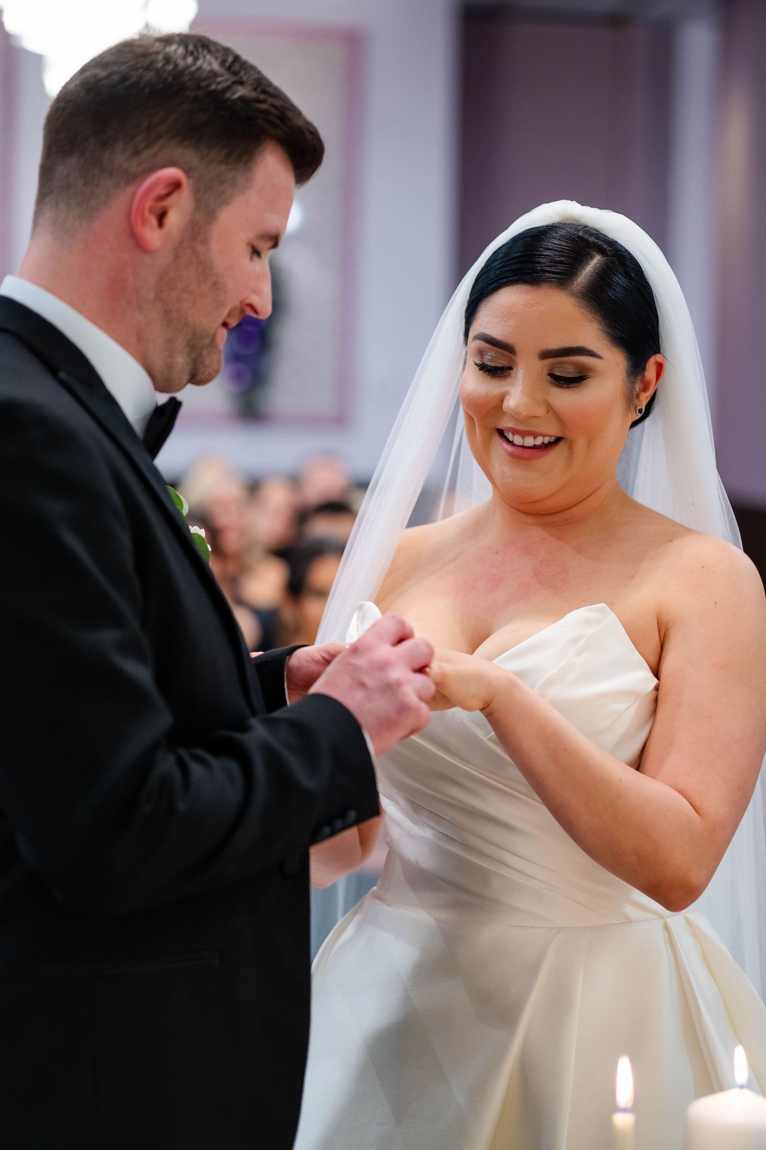 Close-up sequence of a couple sharing an intimate first dance moment at their wedding reception.
