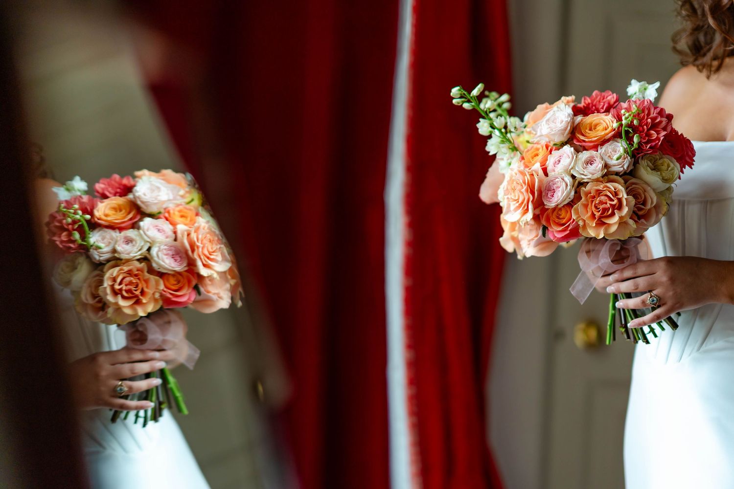 A series of wedding photos showing coral and peach floral bouquets against a deep red curtain backdrop.