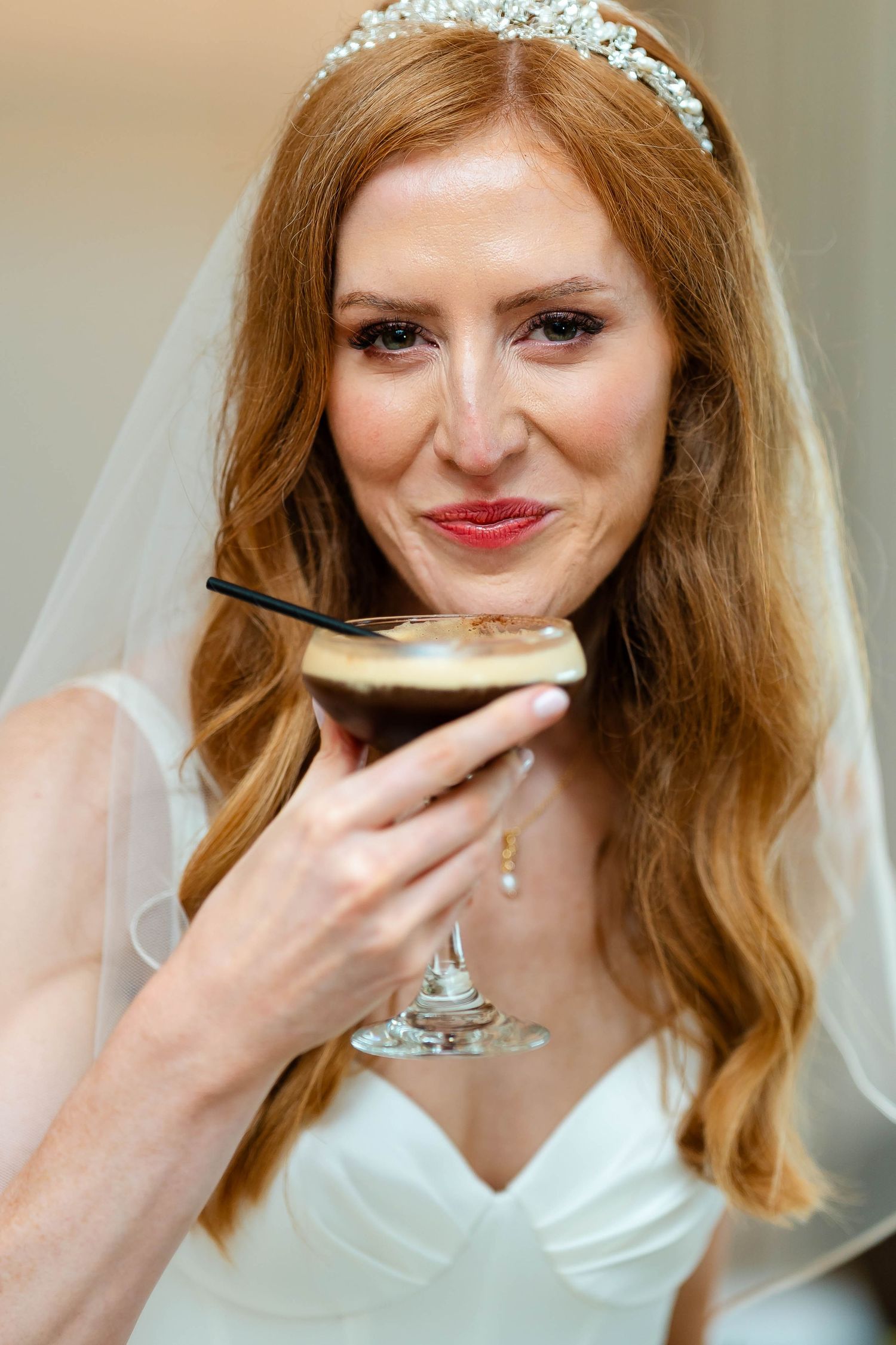 A series of close-up shots showing someone sipping from a champagne glass during a celebration.