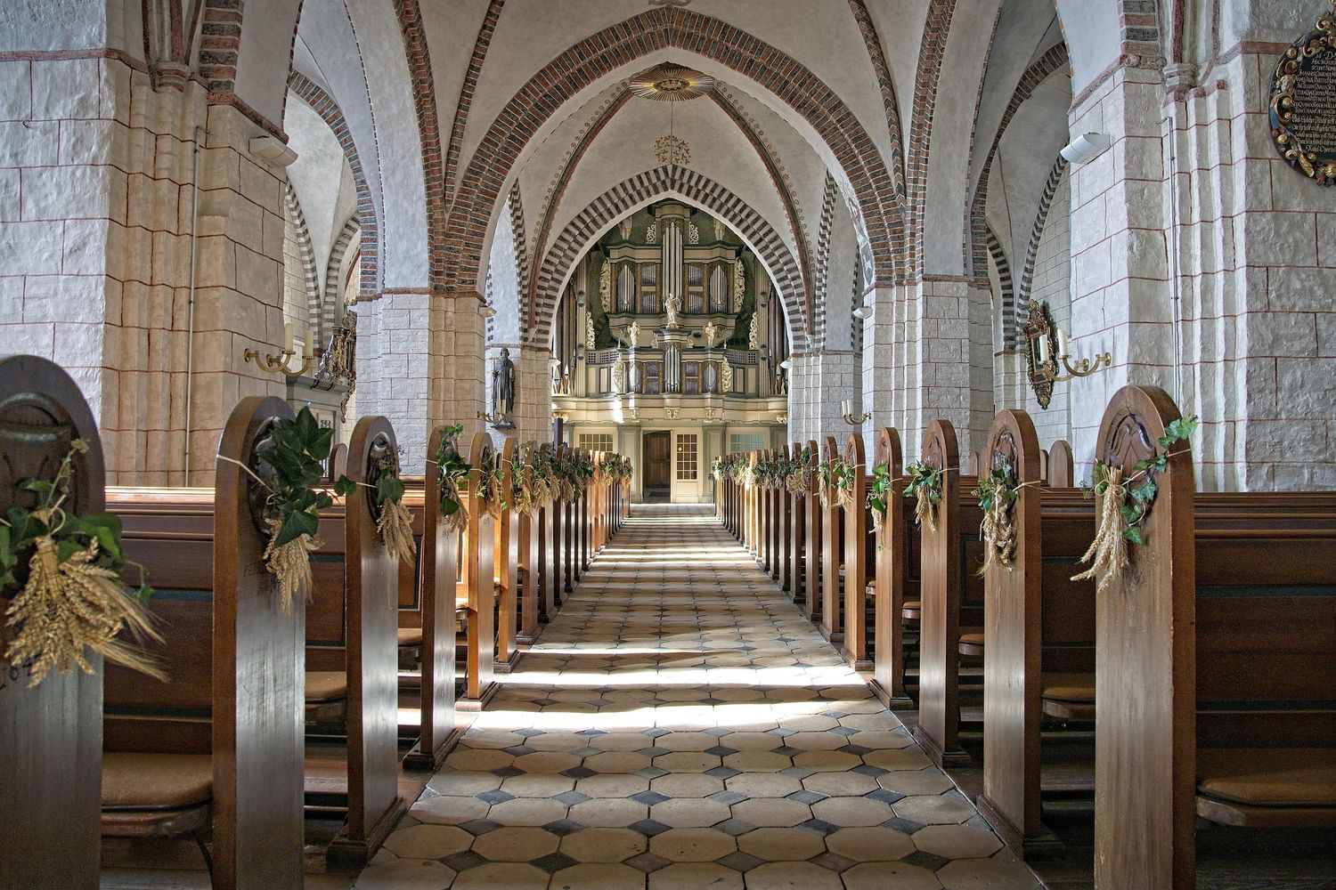 Exterior of a church building in warm lighting