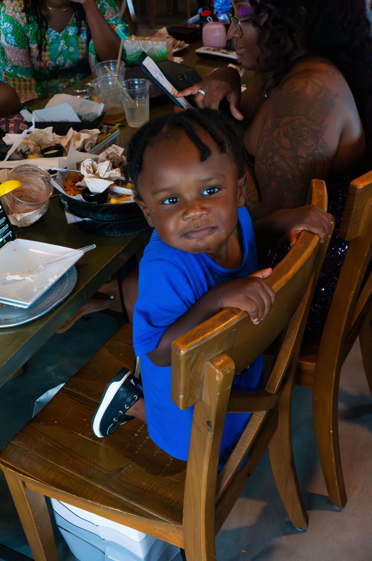 Little boy looking contently at camera
