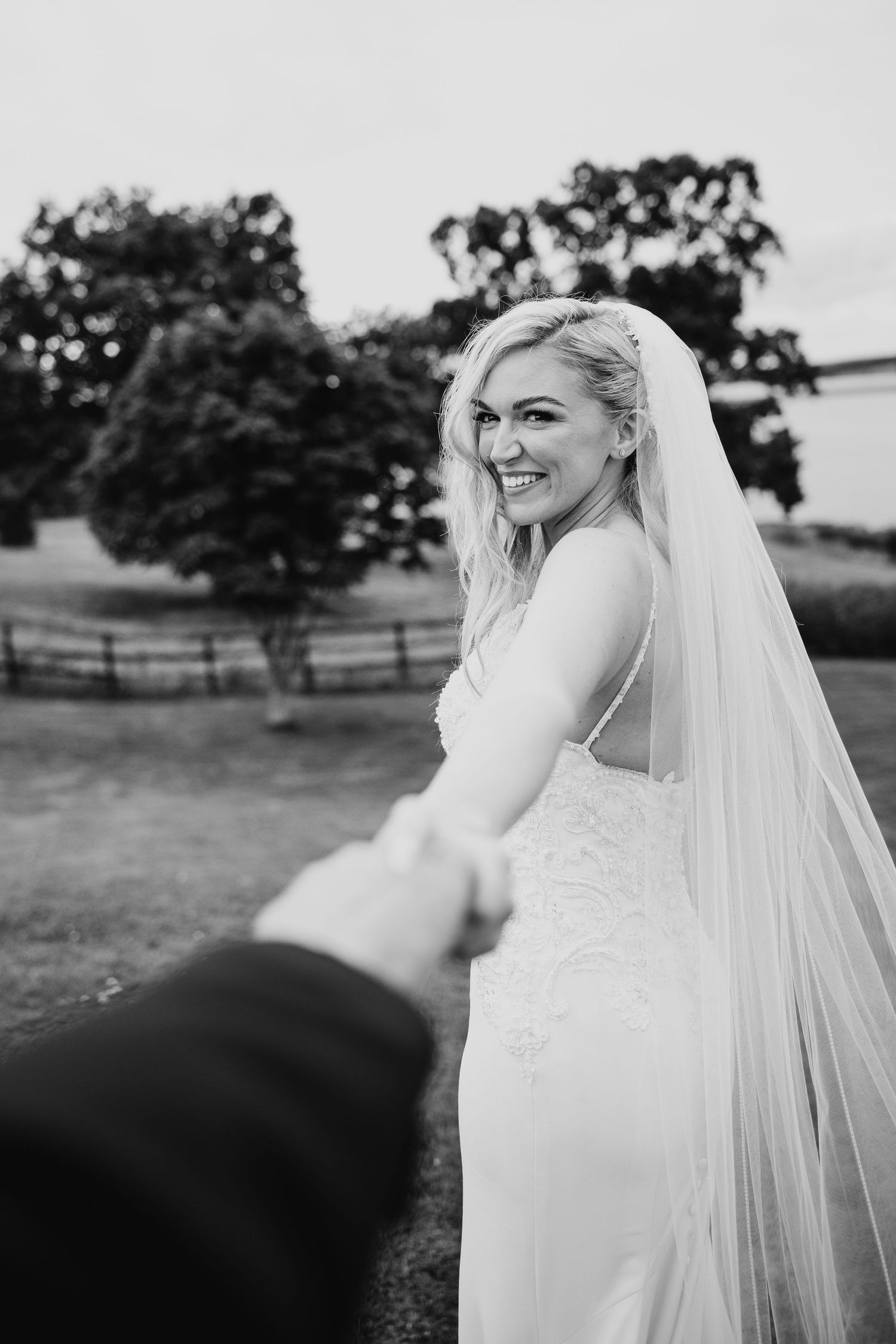 A series of black and white bridal portraits and wedding moments.