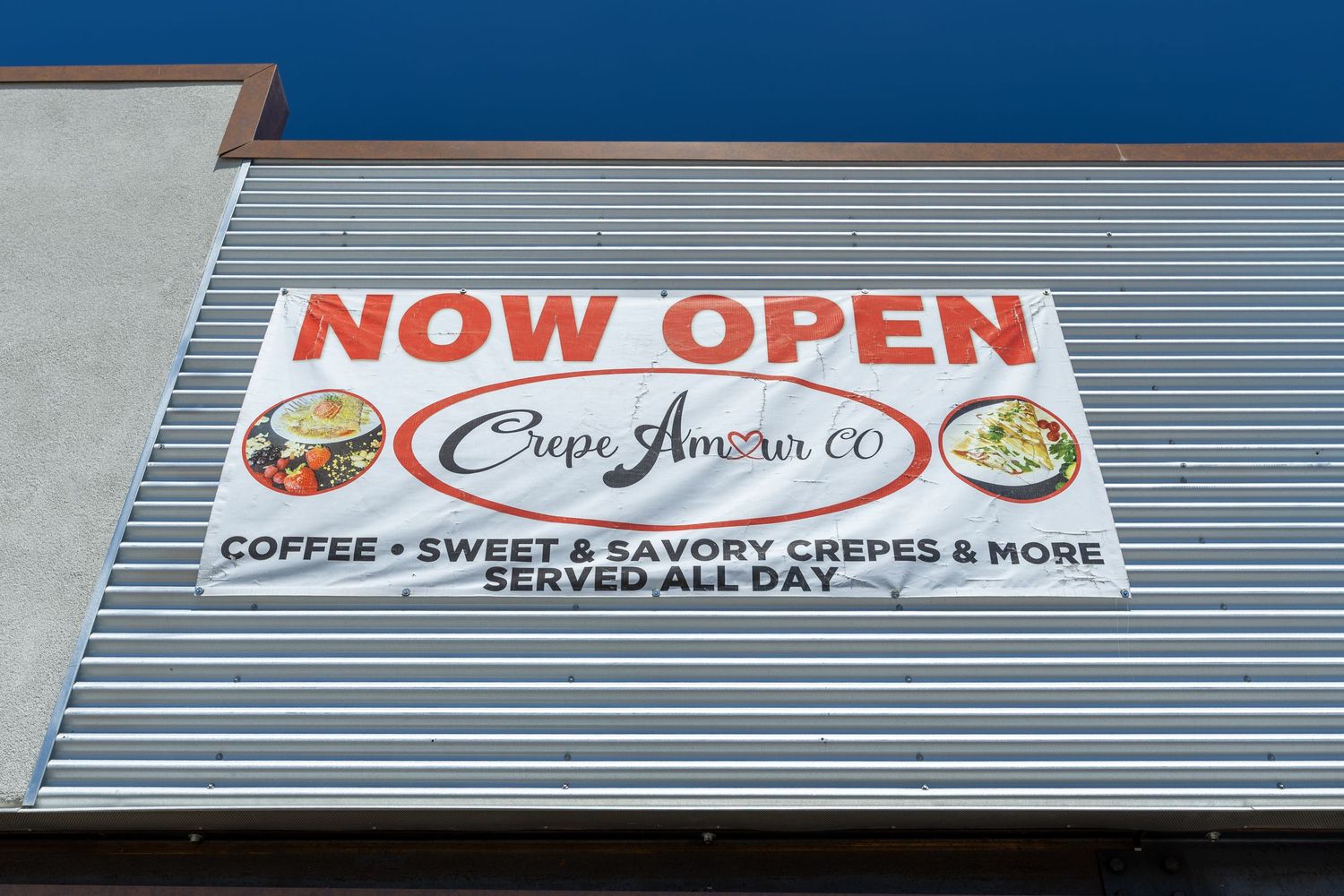 Now Open banner for Crepe Amor Co, offering coffee, sweet and savory crepes served all day.