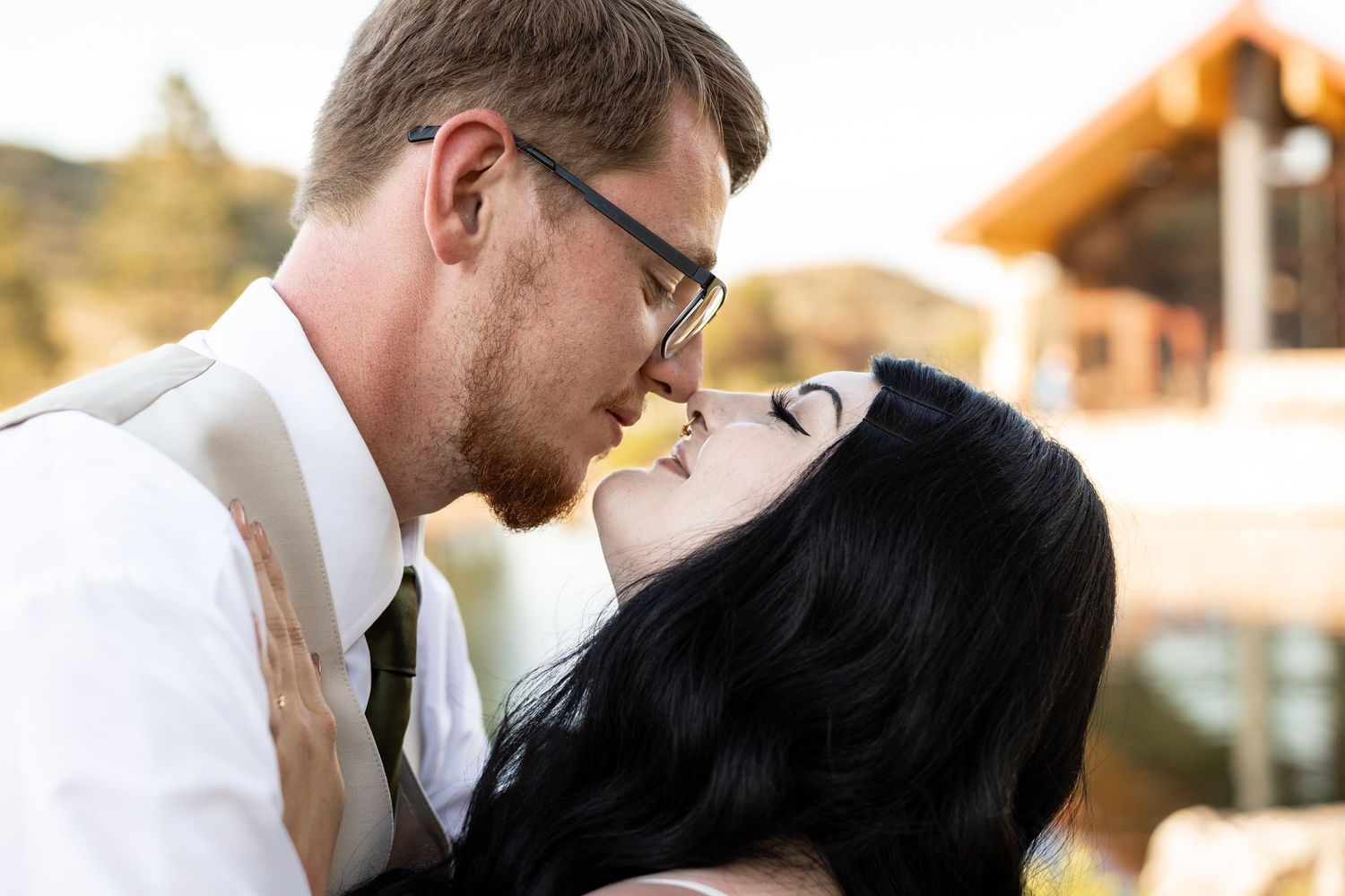 Romantic couple shares tender moments in a series of outdoor wedding photos at sunset.