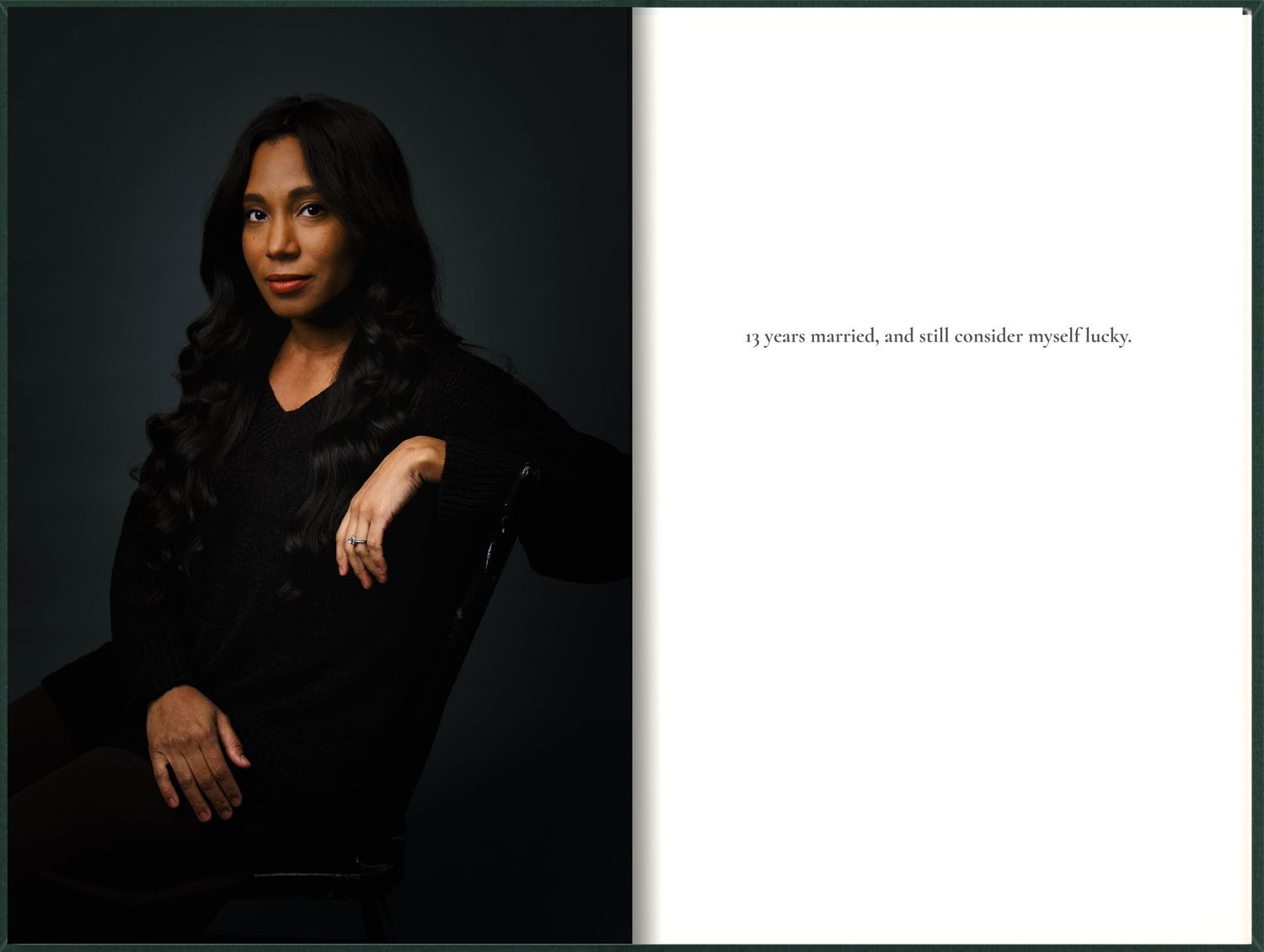 Woman in black outfit seated in chair with inspirational quote on dark background.