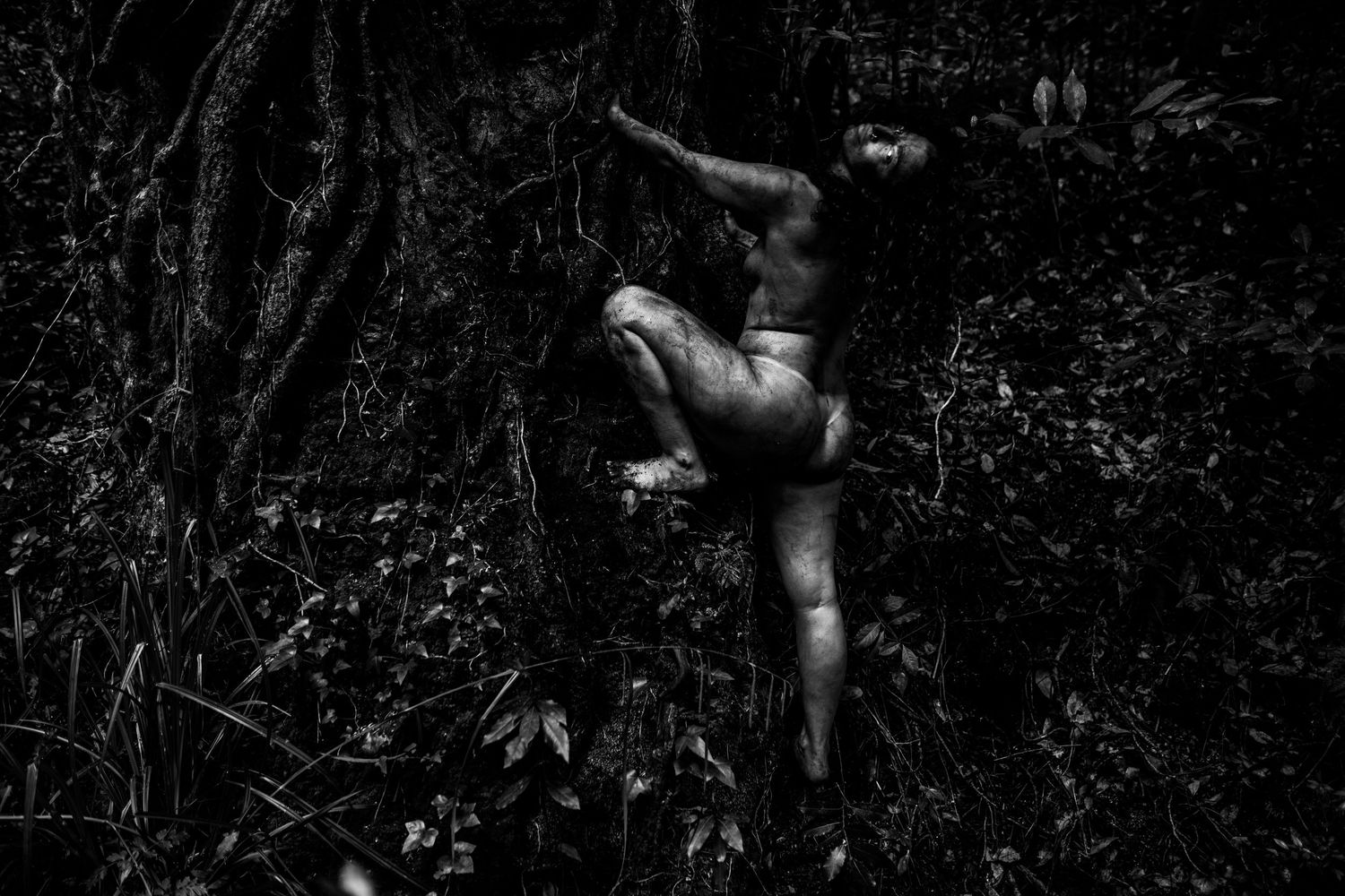 Artistic black and white photography sequence capturing movement in natural setting.