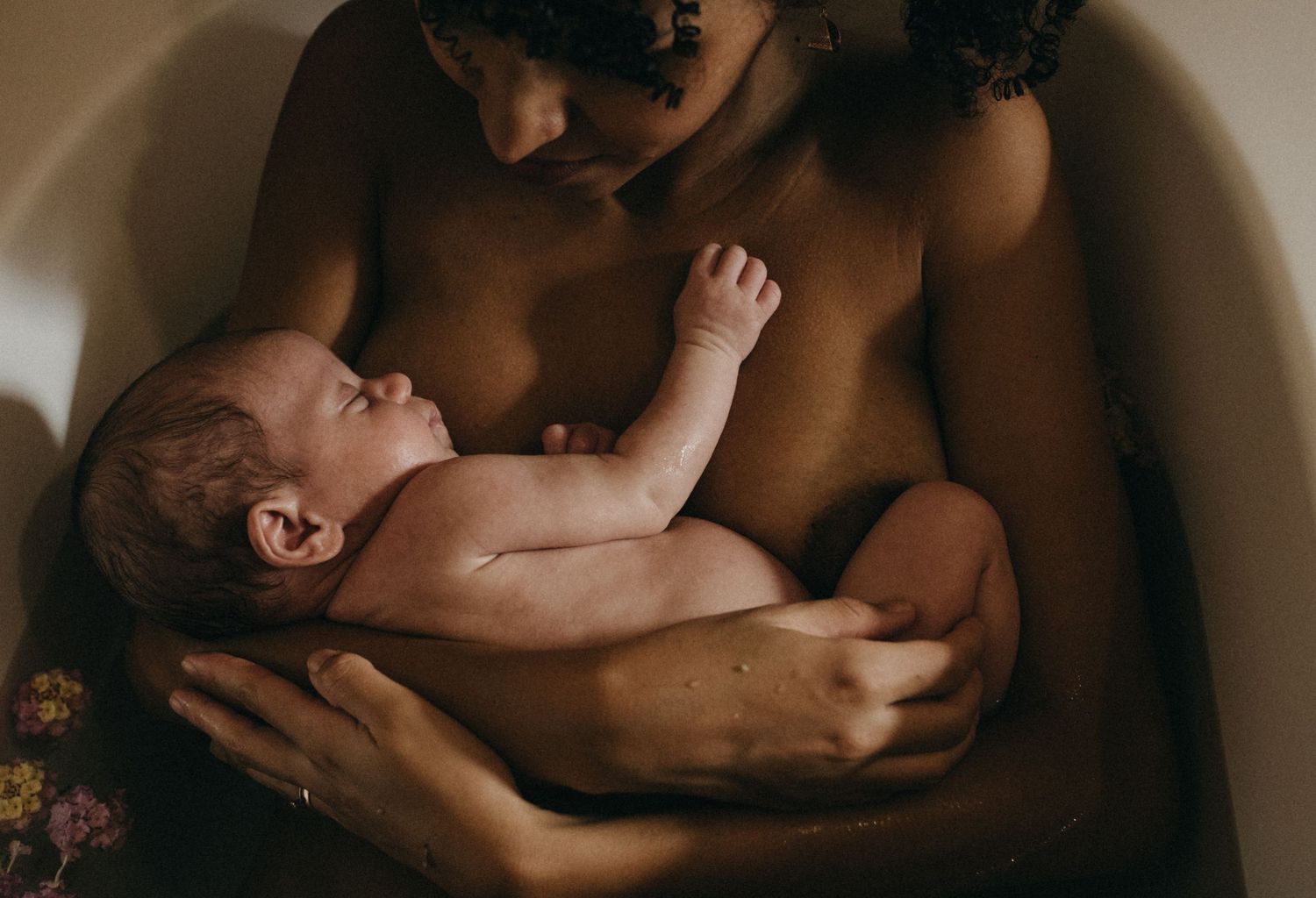 Artistic black and white photography showing intimate moments in natural light.