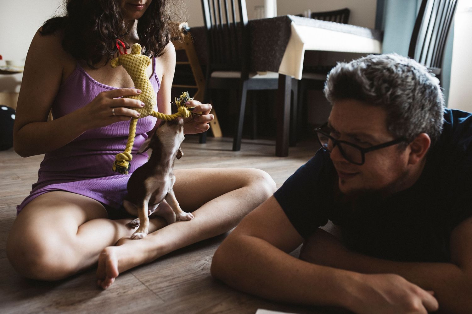 Series of intimate candid moments captured in moody indoor lighting.
