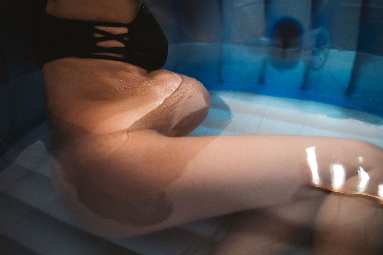 Abstract blue-tinted photography with soft focus and gentle light patterns.