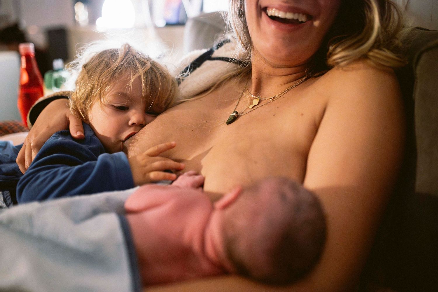 Close-up shot capturing joyful expressions during a birth experience.