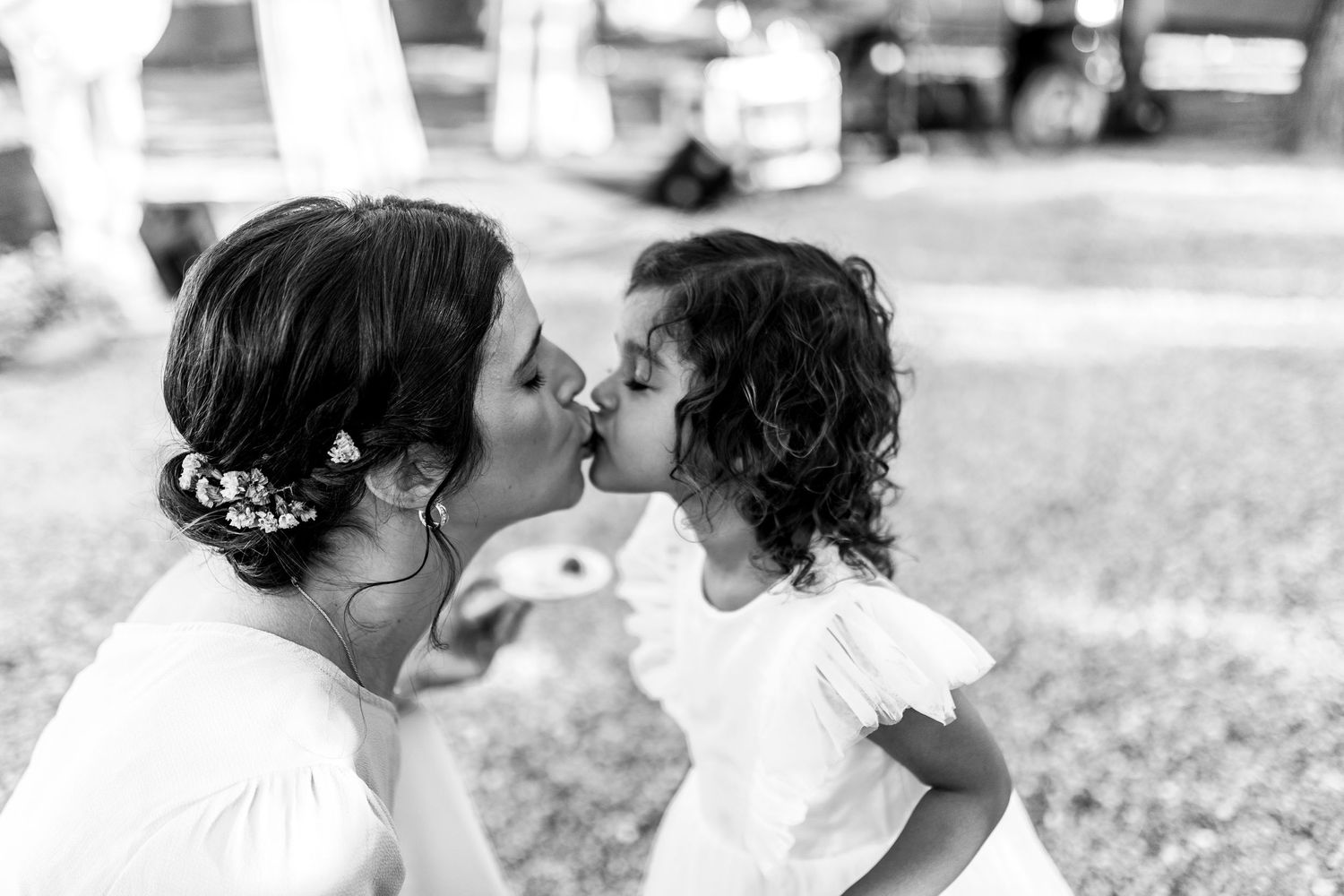 Candid wedding moments captured in a series of romantic outdoor portraits.