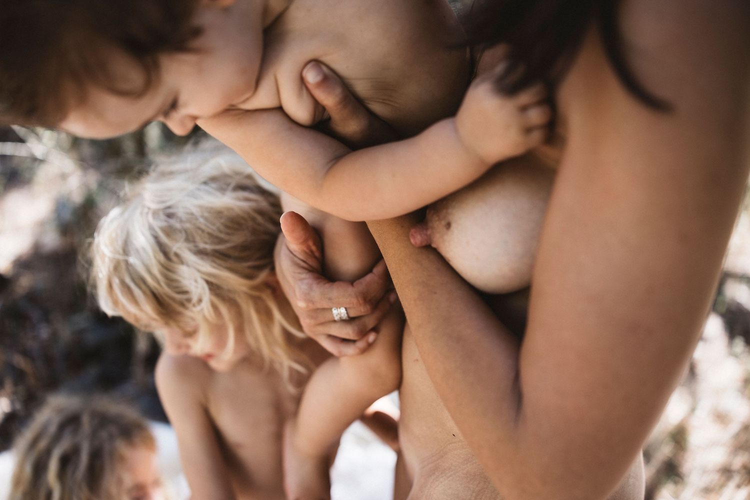 Intimate lifestyle photography with soft natural lighting and gentle moments.