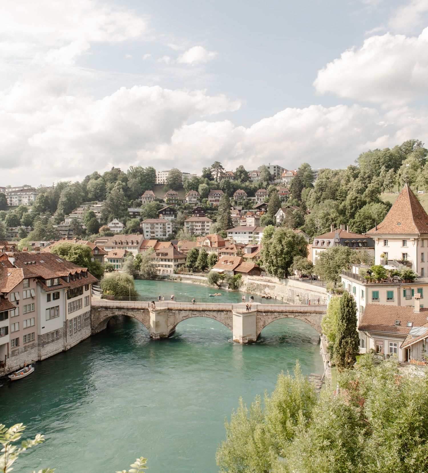 Landscape photography of river, trees and buildings in Bern, Switzerland