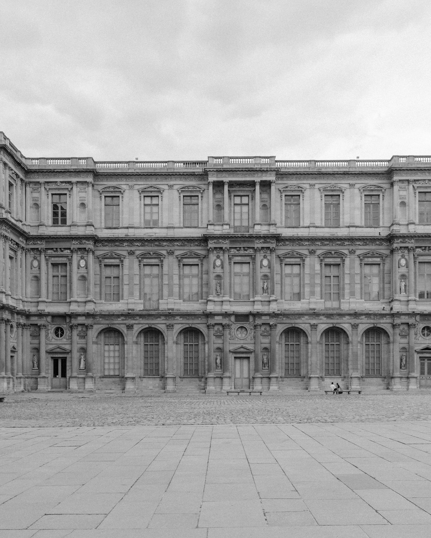 Black and white image of town square in Paris, France.
