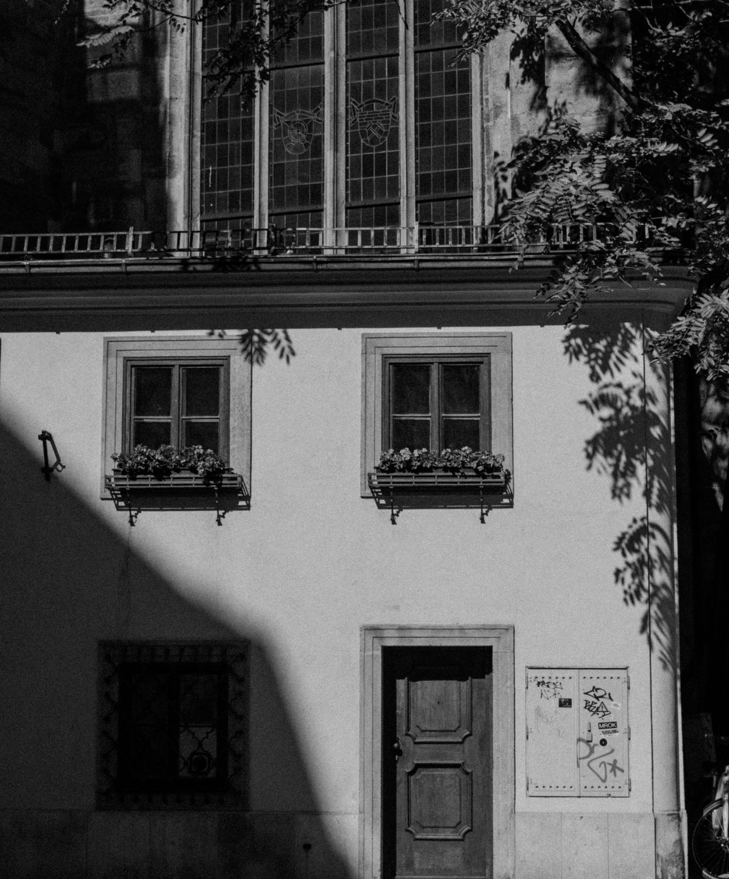 Dramatic black and white image of light and shadow on a building in Vienna, Austria.