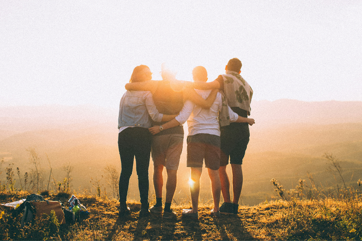 Image of a group of 4 friends enjoying their community