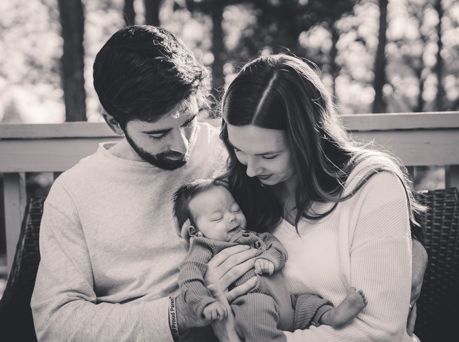 Black and white collage of intimate family moments showing affectionate embraces and tender interactions.