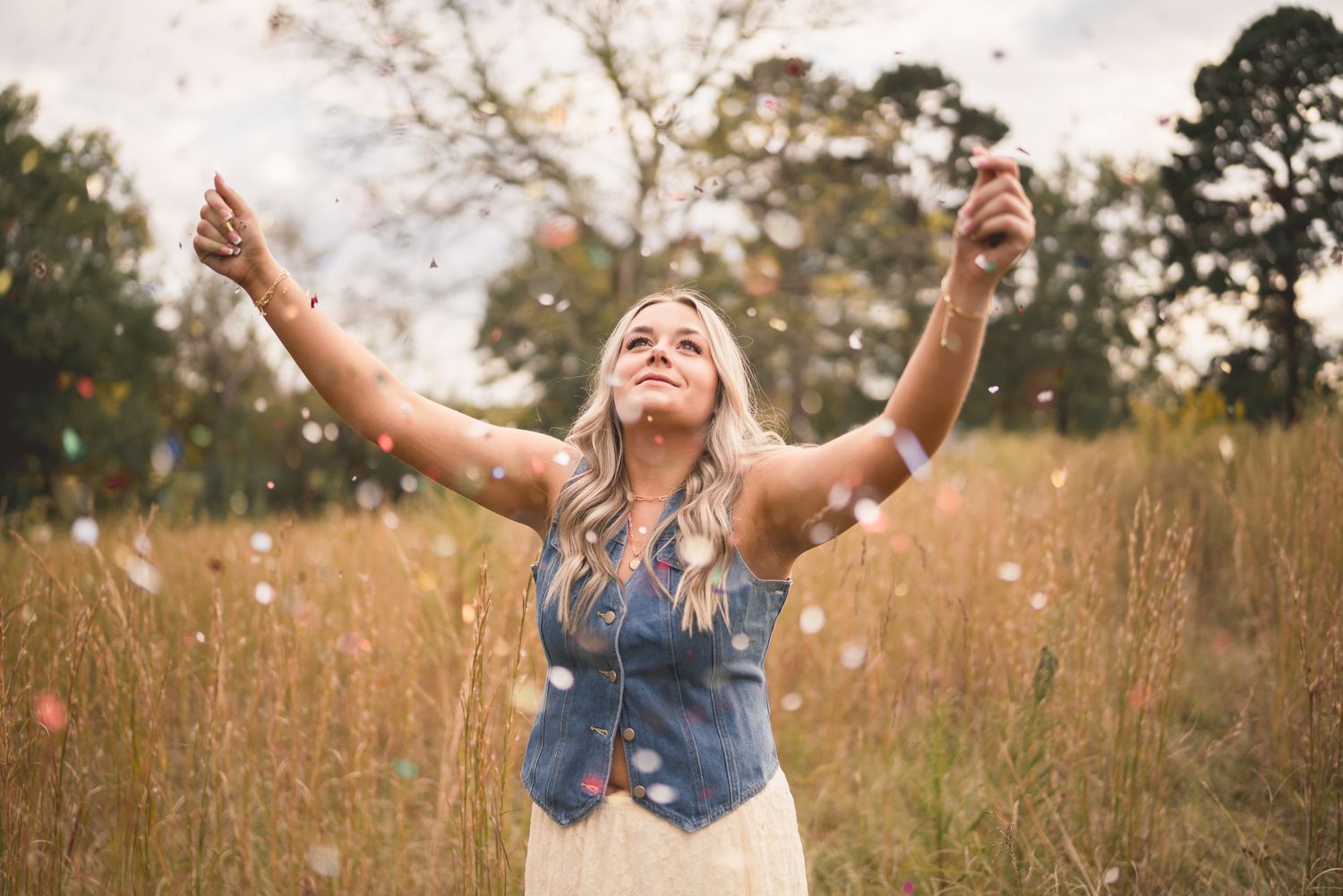 A sequence of joyful moments captured in a wildflower field with someone throwing petals in golden afternoon light.