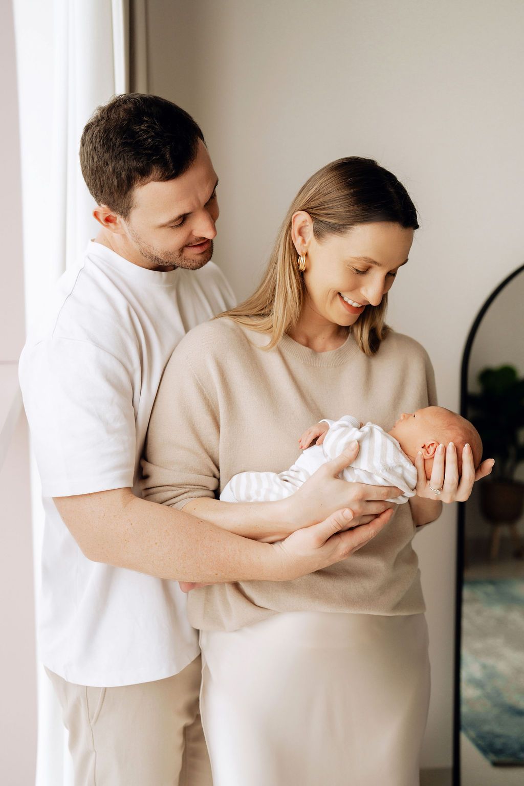 happy family with a newborn baby