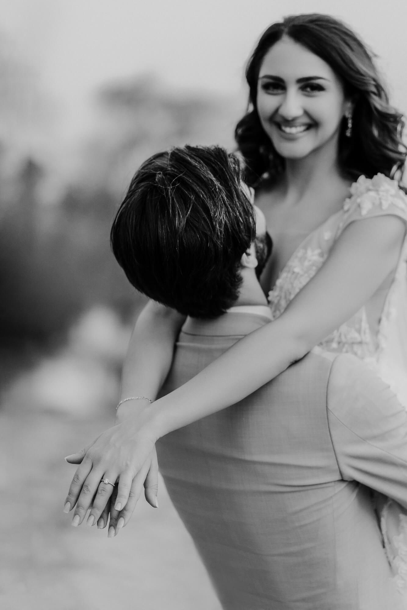 Black and white sequence of intimate couple dance poses showing tender embraces and joyful movement.