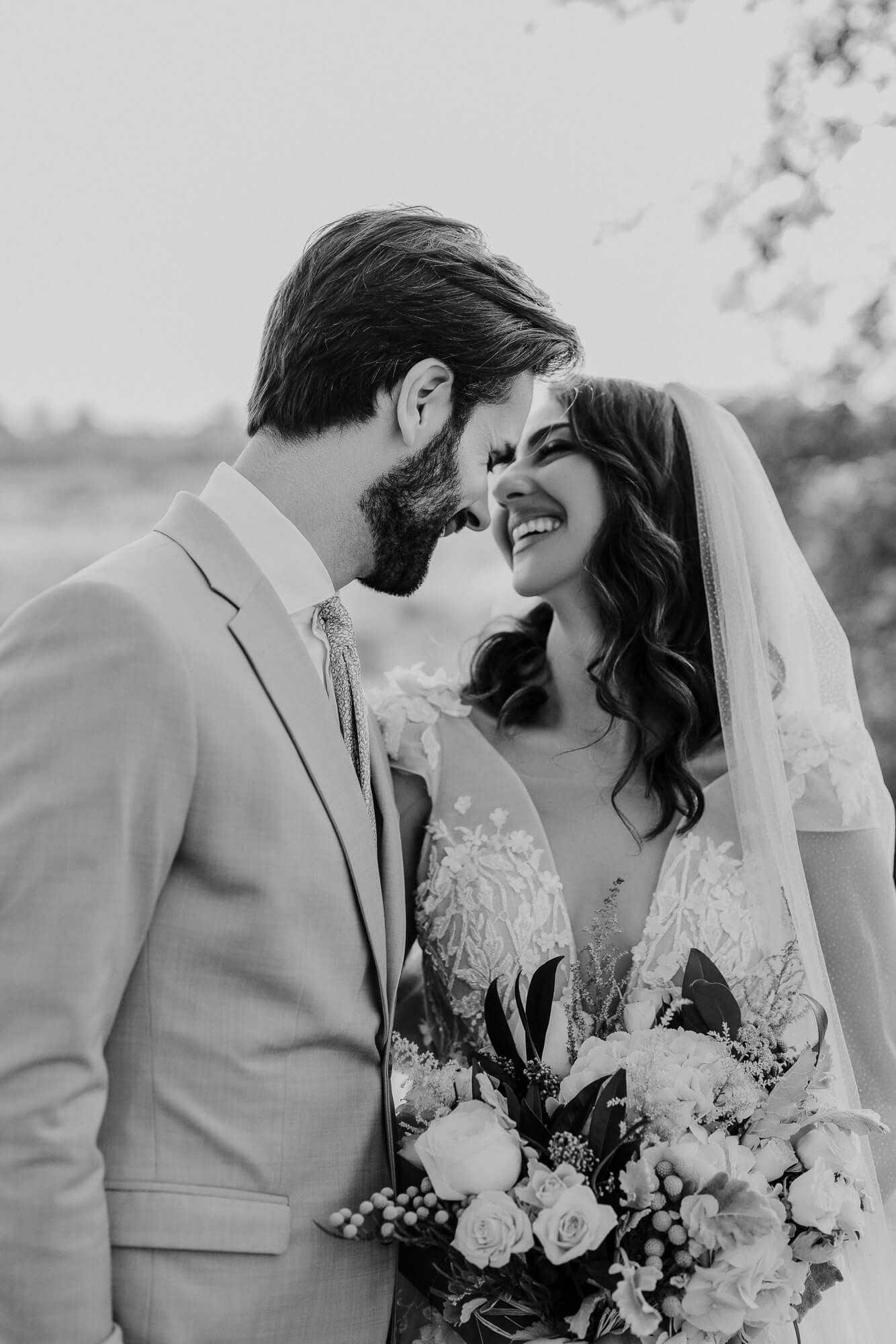 A romantic black and white photo sequence shows a couple laughing and kissing while holding a floral bouquet at their wedding.