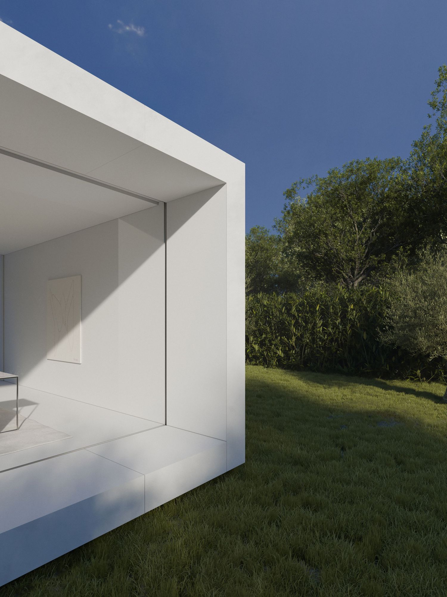 Minimalist white cubic structure with covered terrace extending into green landscaped garden.
