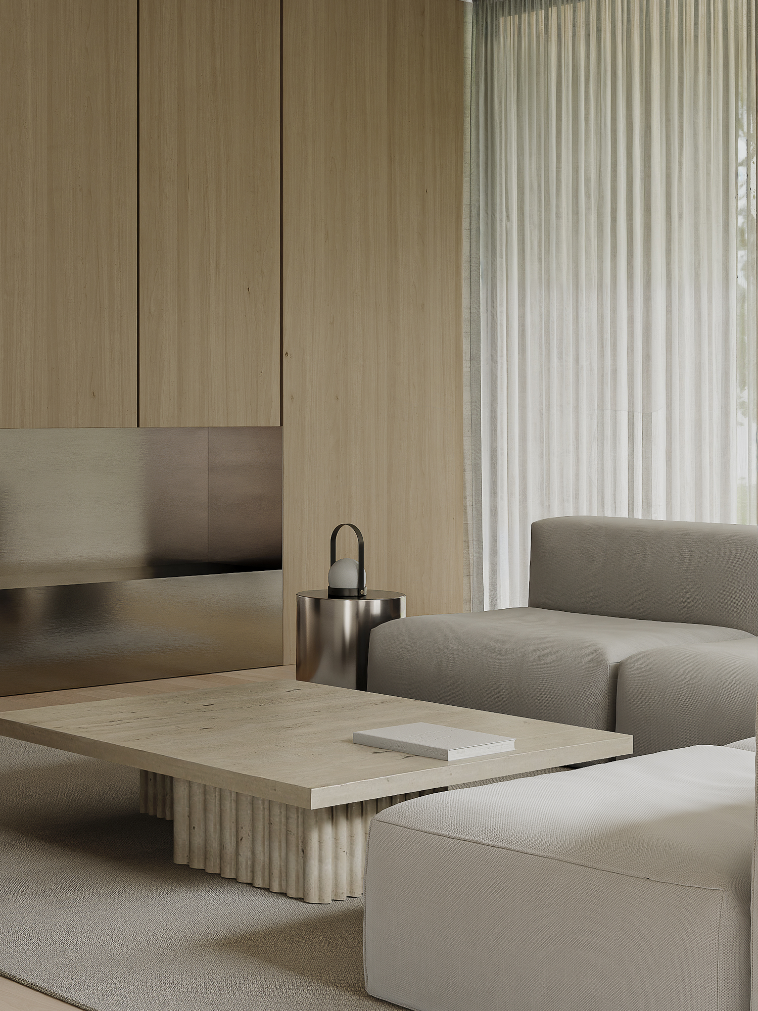 Minimalist living room with beige sectional sofa, fluted coffee table and sheer curtains in neutral tones.