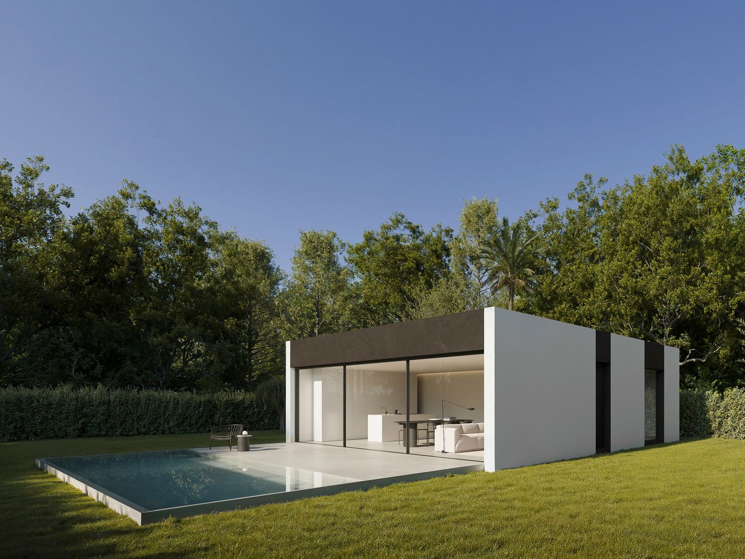 Minimalist modern white poolhouse pavilion with floor-to-ceiling glass windows overlooking a swimming pool in a lush garden setting.