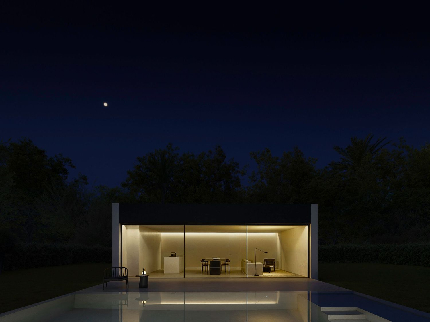 Modern minimalist glass house with illuminated interior and reflecting pool under a starlit night sky.