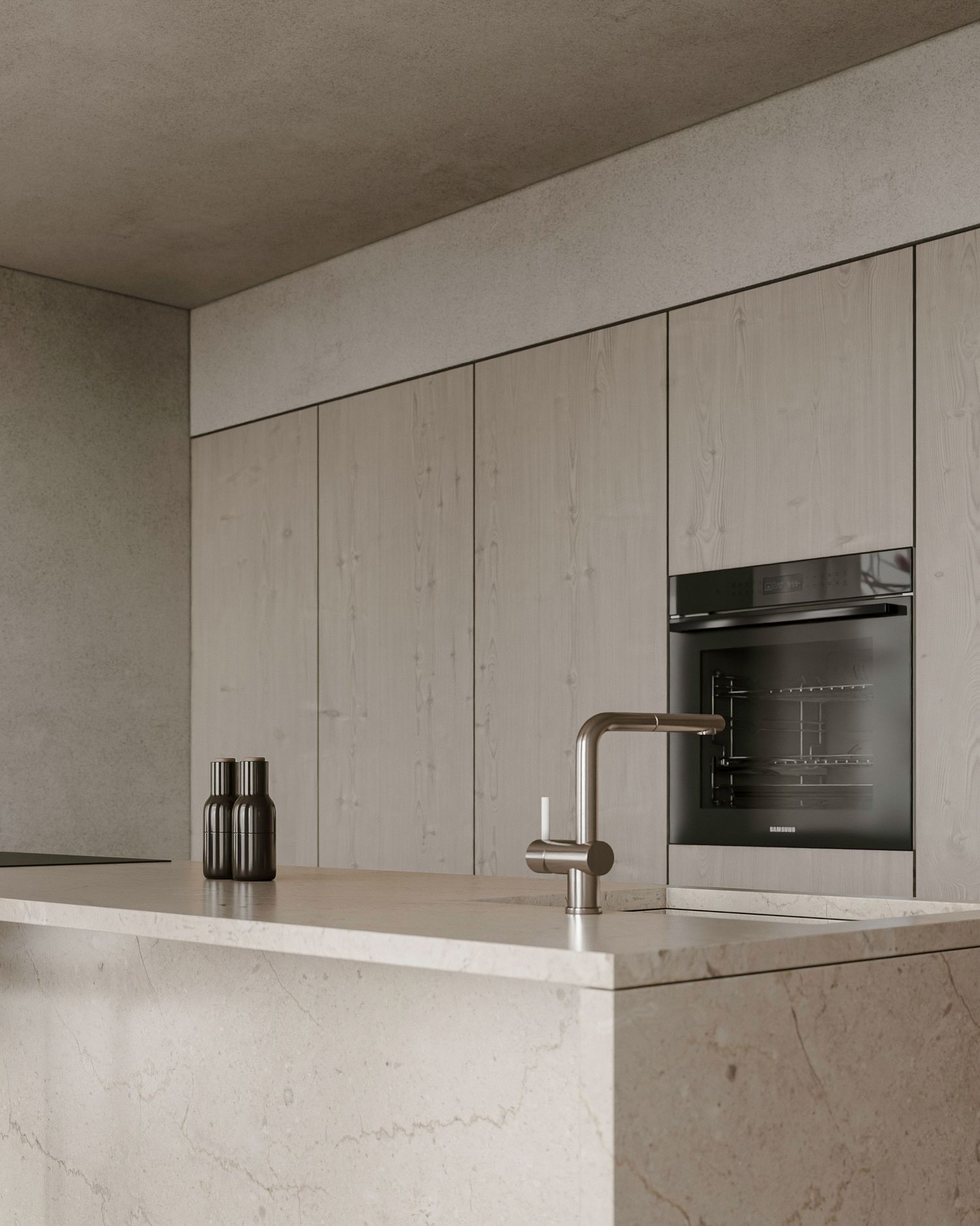 Modern minimalist kitchen interior with sleek white cabinetry, built-in oven, and marble countertop featuring a stylish metal faucet.